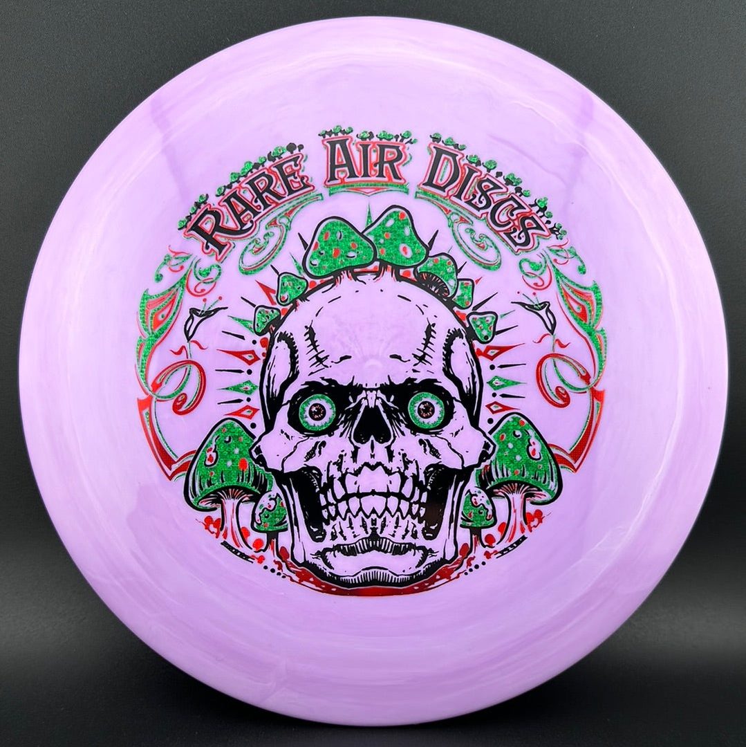 Aura Coalesce - Crushin' Amanitas stamp by Manny Trujillo