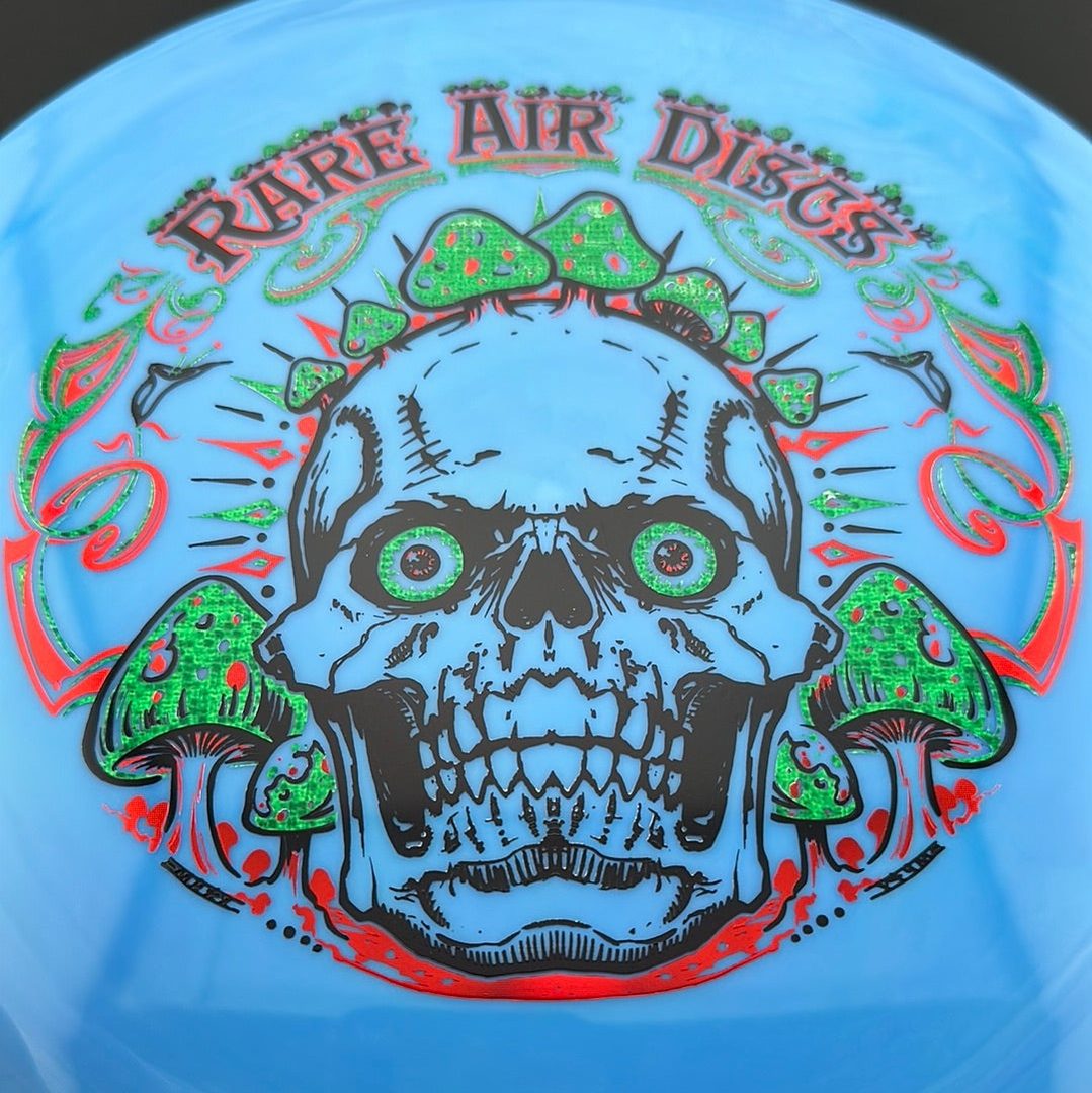 Aura Coalesce - Crushin' Amanitas stamp by Manny Trujillo