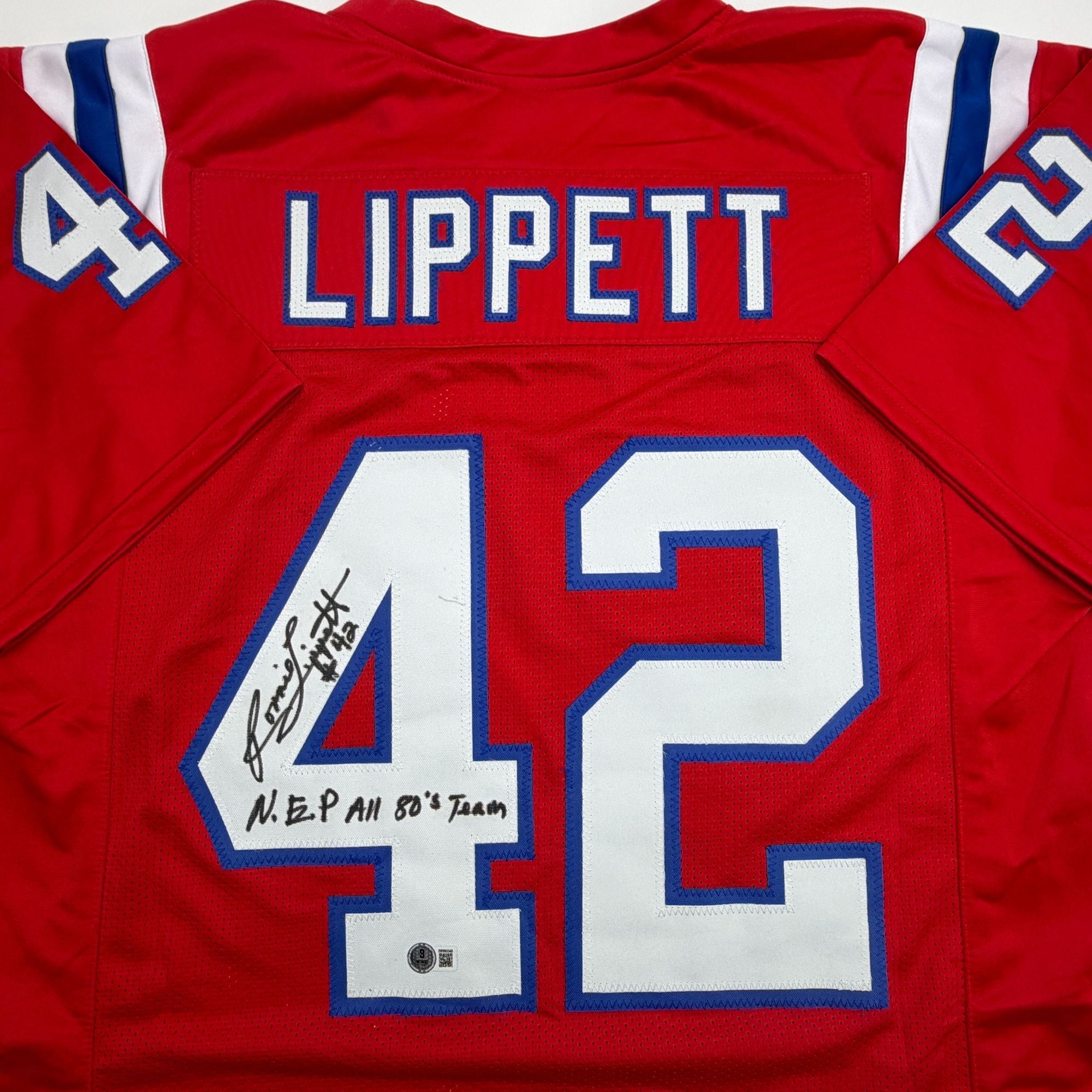 Autographed/Signed Ronnie Lippett New England Red Football Jersey Beckett BAS COA
