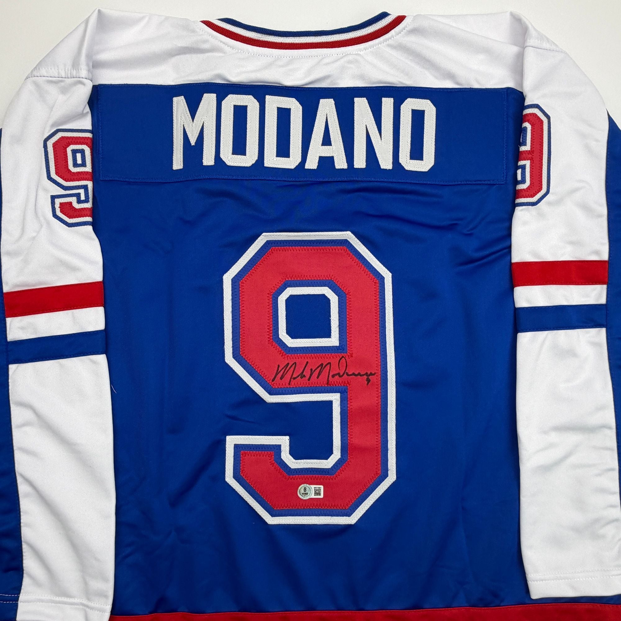 Autographed/Signed Mike Modano Team USA Blue Hockey Jersey Beckett BAS COA