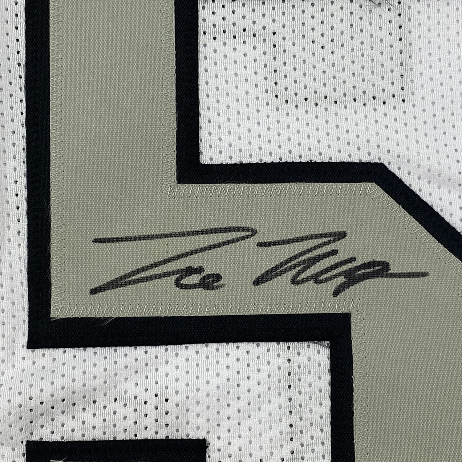 Framed Autographed/Signed Trevon Moehrig 35x39 Las Vegas Oakland White Color Rush Football Jersey JSA COA