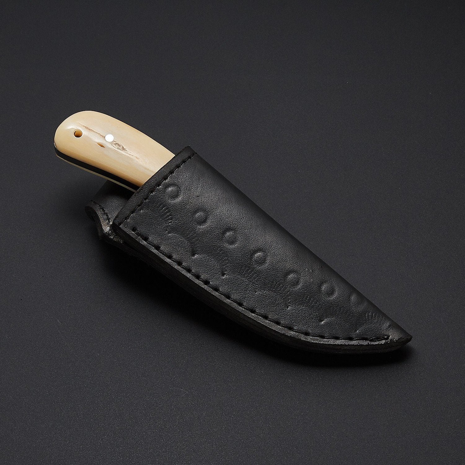 The Fieldmaster's Companion: 7.5-Inch Skinning Hunting Knife with Full Tang D2 Steel Blade, Bone Handle, and Steel Bolster