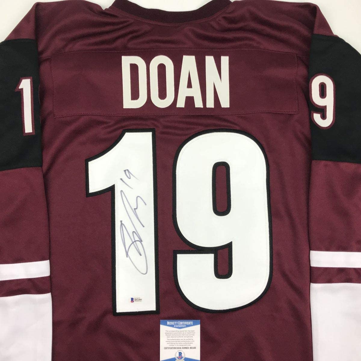 Autographed/Signed Shane Doan Arizona Maroon Hockey Jersey Beckett BAS COA