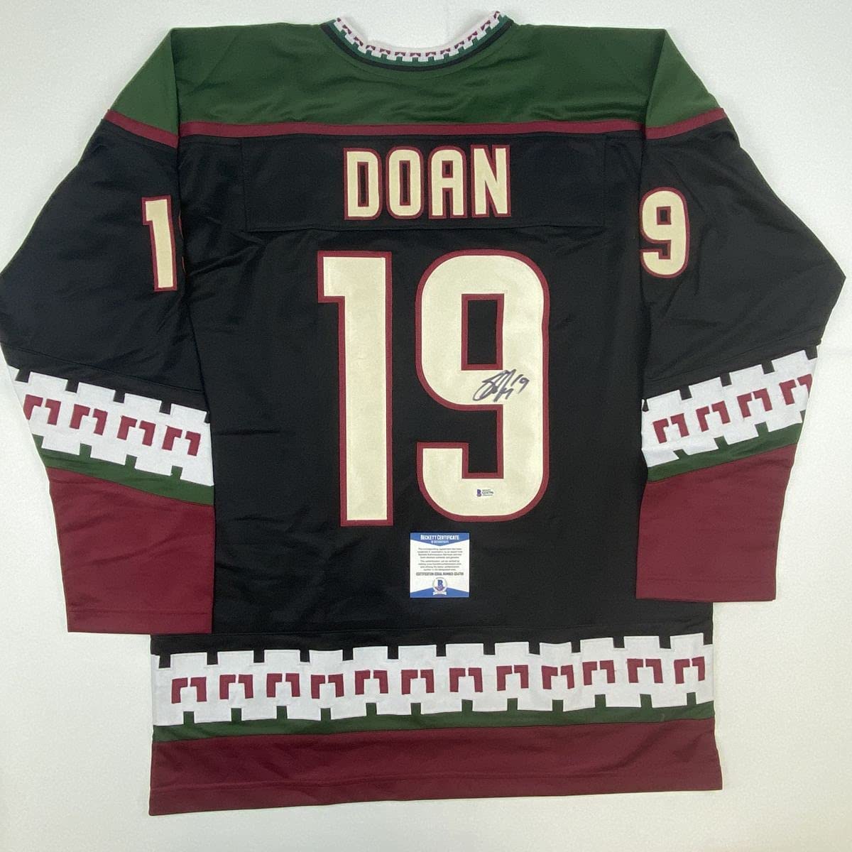 Autographed/Signed Shane Doan Arizona Black Hockey Jersey Beckett BAS COA