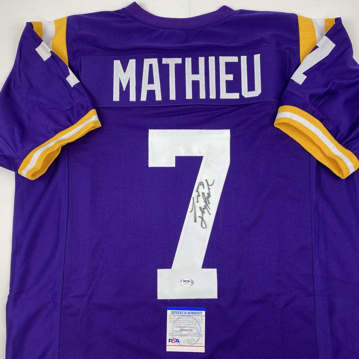 Autographed/Signed Tyrann Mathieu Inscribed Honey Badger LSU Purple College Football Jersey PSA/DNA COA