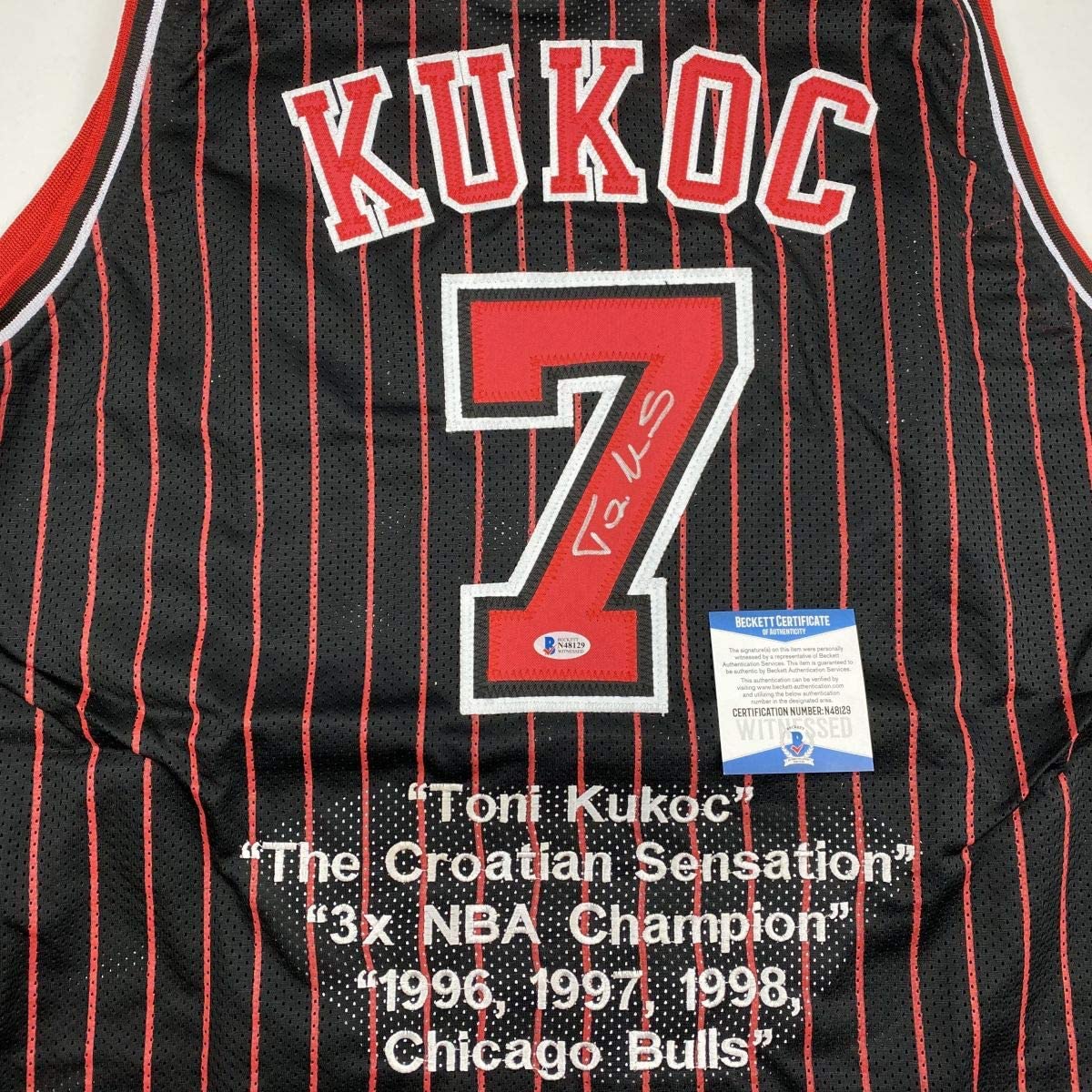 Autographed/Signed Toni Kukoc Chicago Black Pinstripe Stat Basketball Jersey Beckett BAS COA