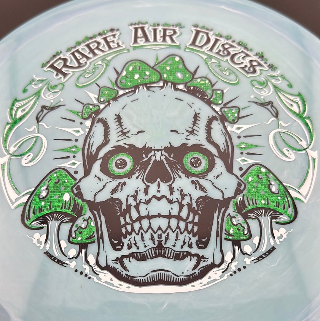 Aura Coalesce - Crushin' Amanitas stamp by Manny Trujillo