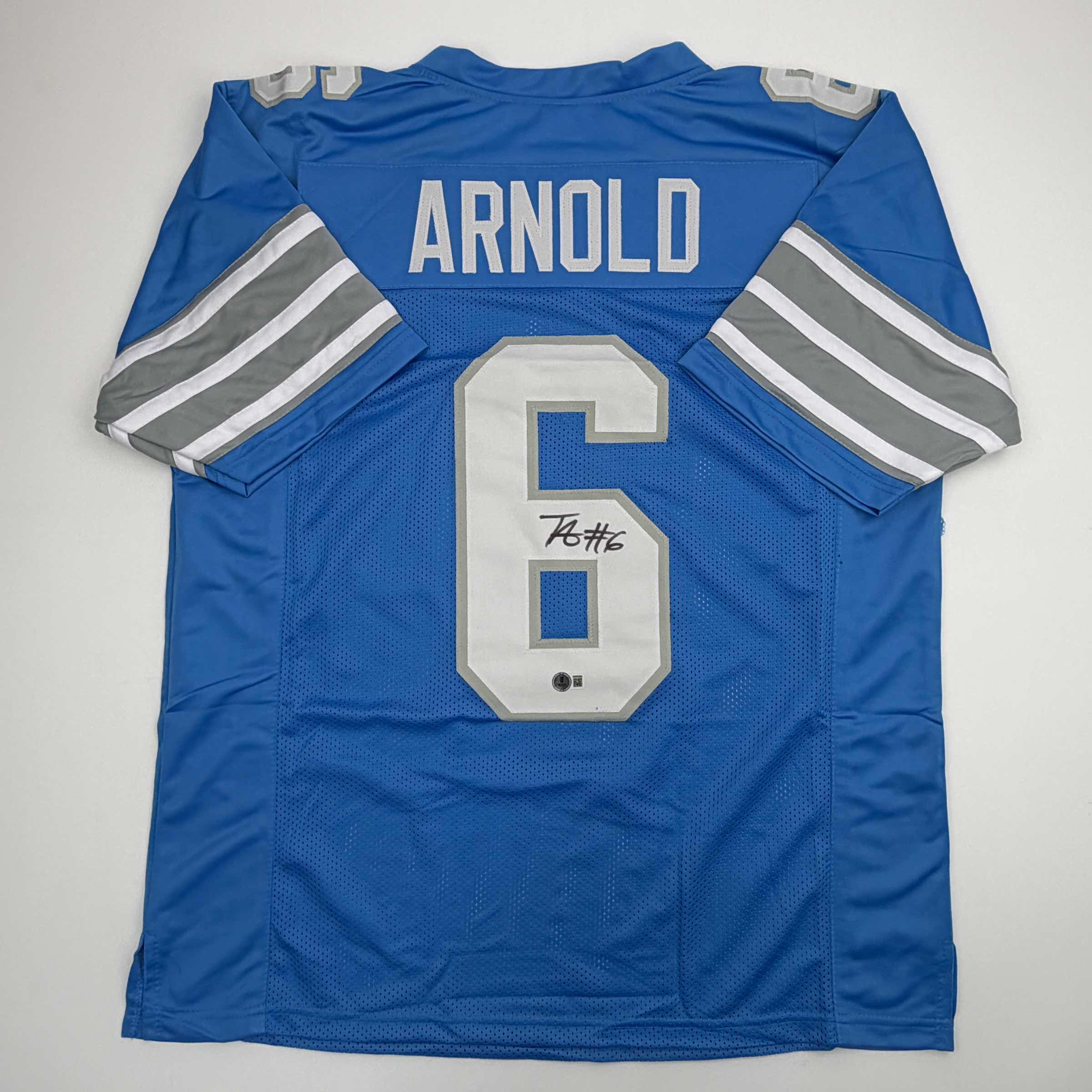Autographed/Signed Terrion Arnold Detroit Blue Football Jersey Beckett BAS COA