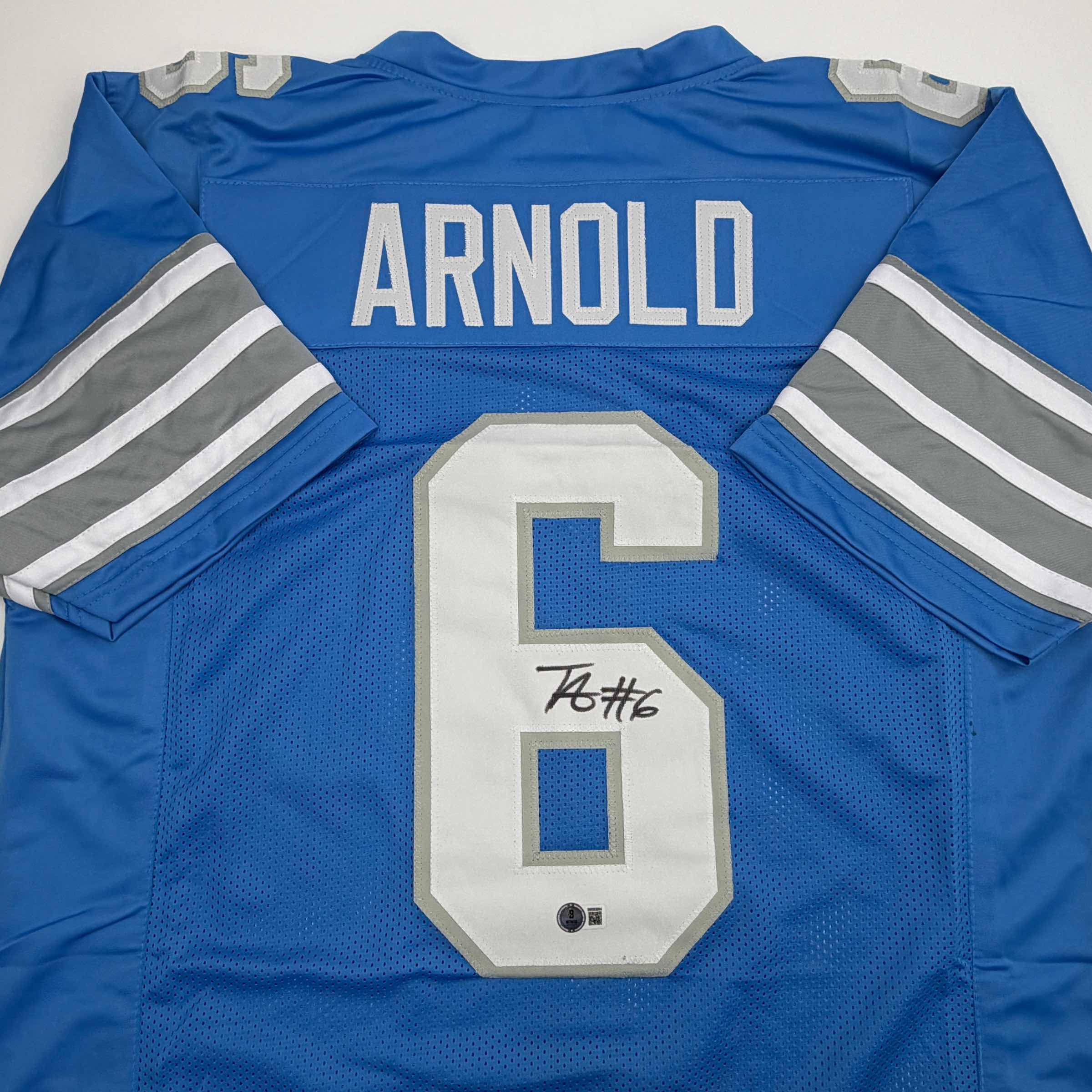Autographed/Signed Terrion Arnold Detroit Blue Football Jersey Beckett BAS COA