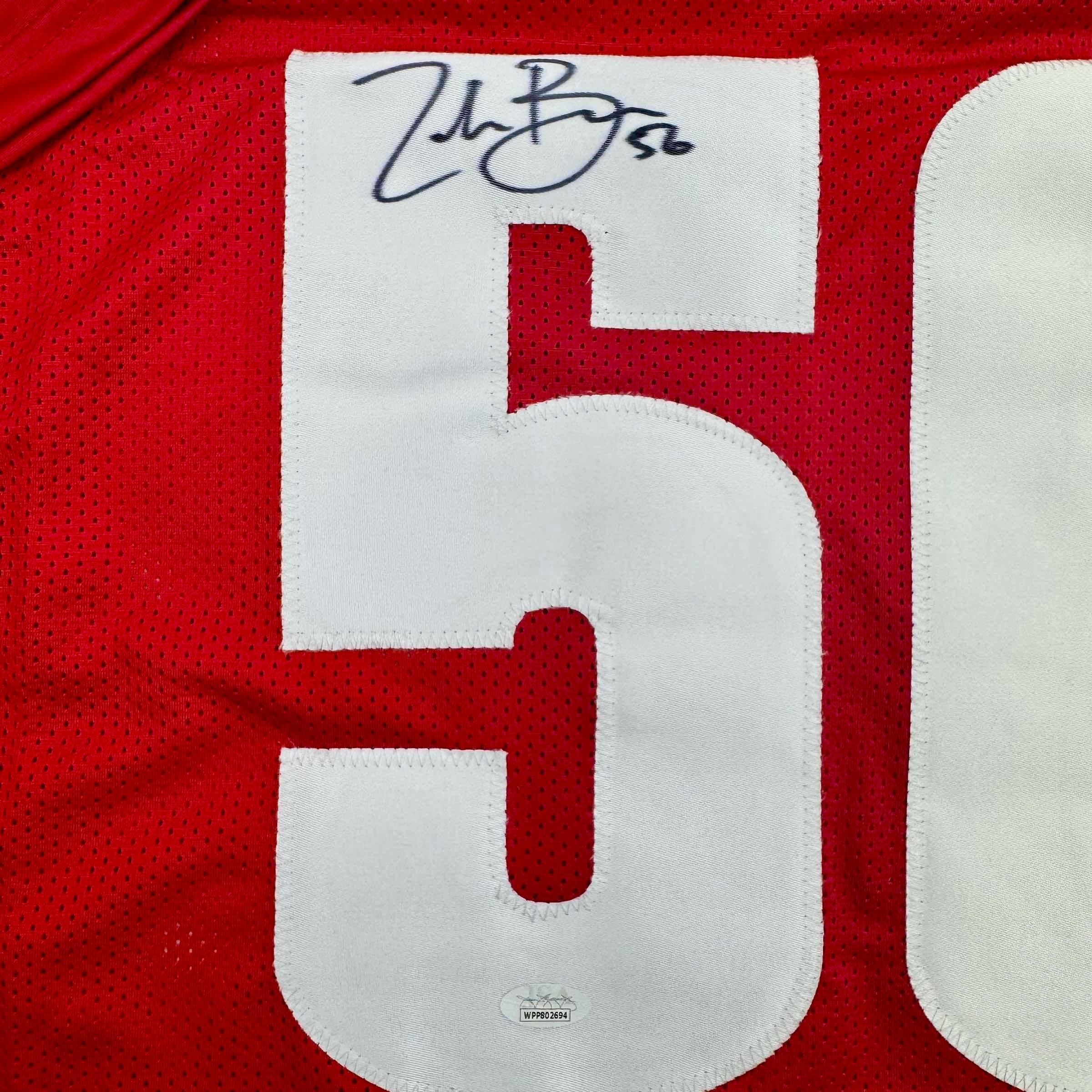 Autographed/Signed Zack Baun Wisconsin Red College Football Jersey JSA COA