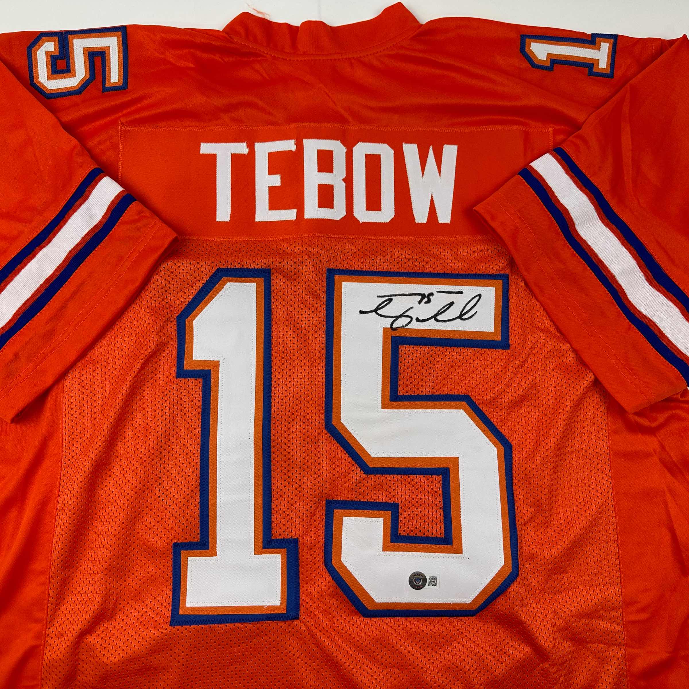 Autographed/Signed Tim Tebow Florida Orange College Football Jersey Beckett BAS COA