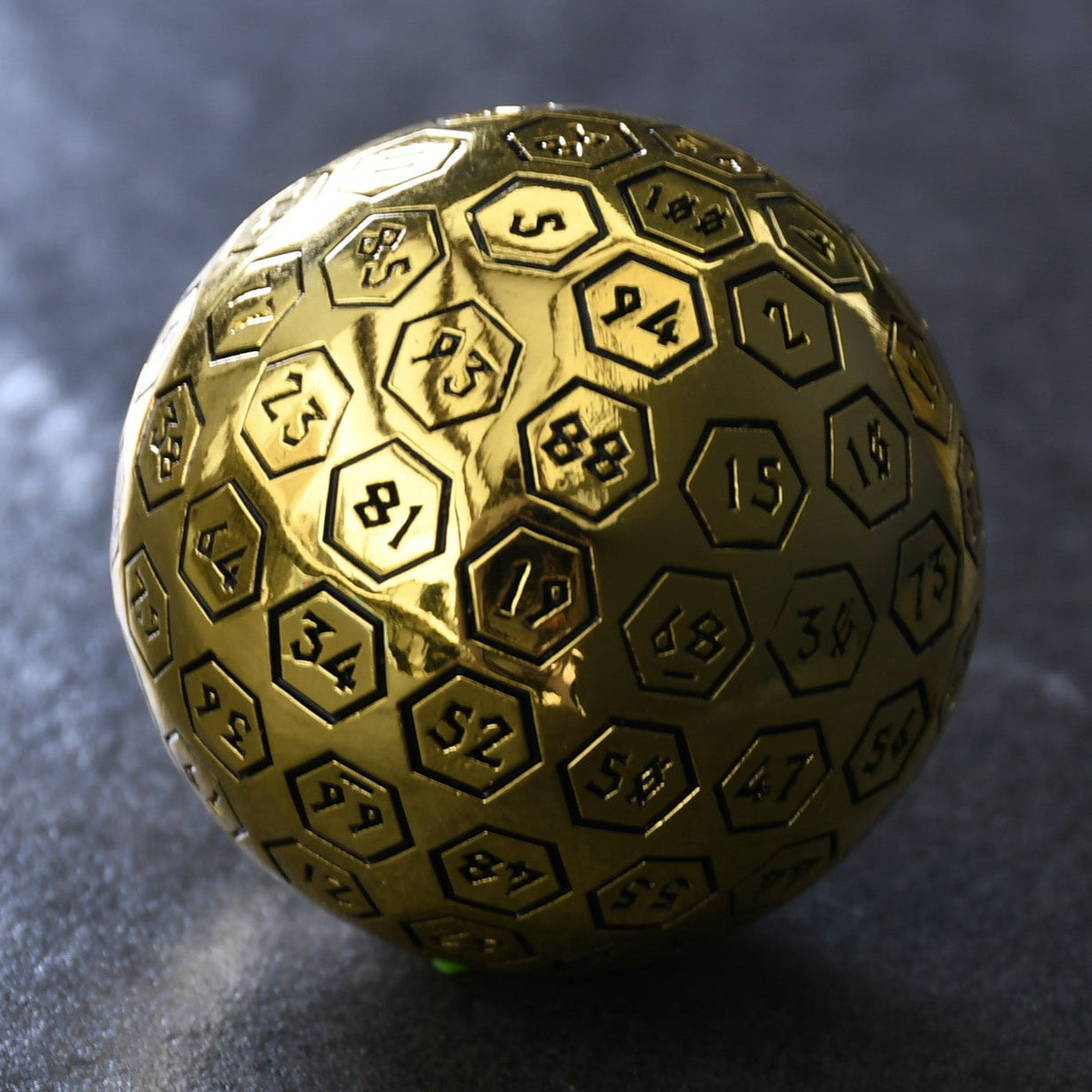 The Orb D100 - Black and Gold Metal Die