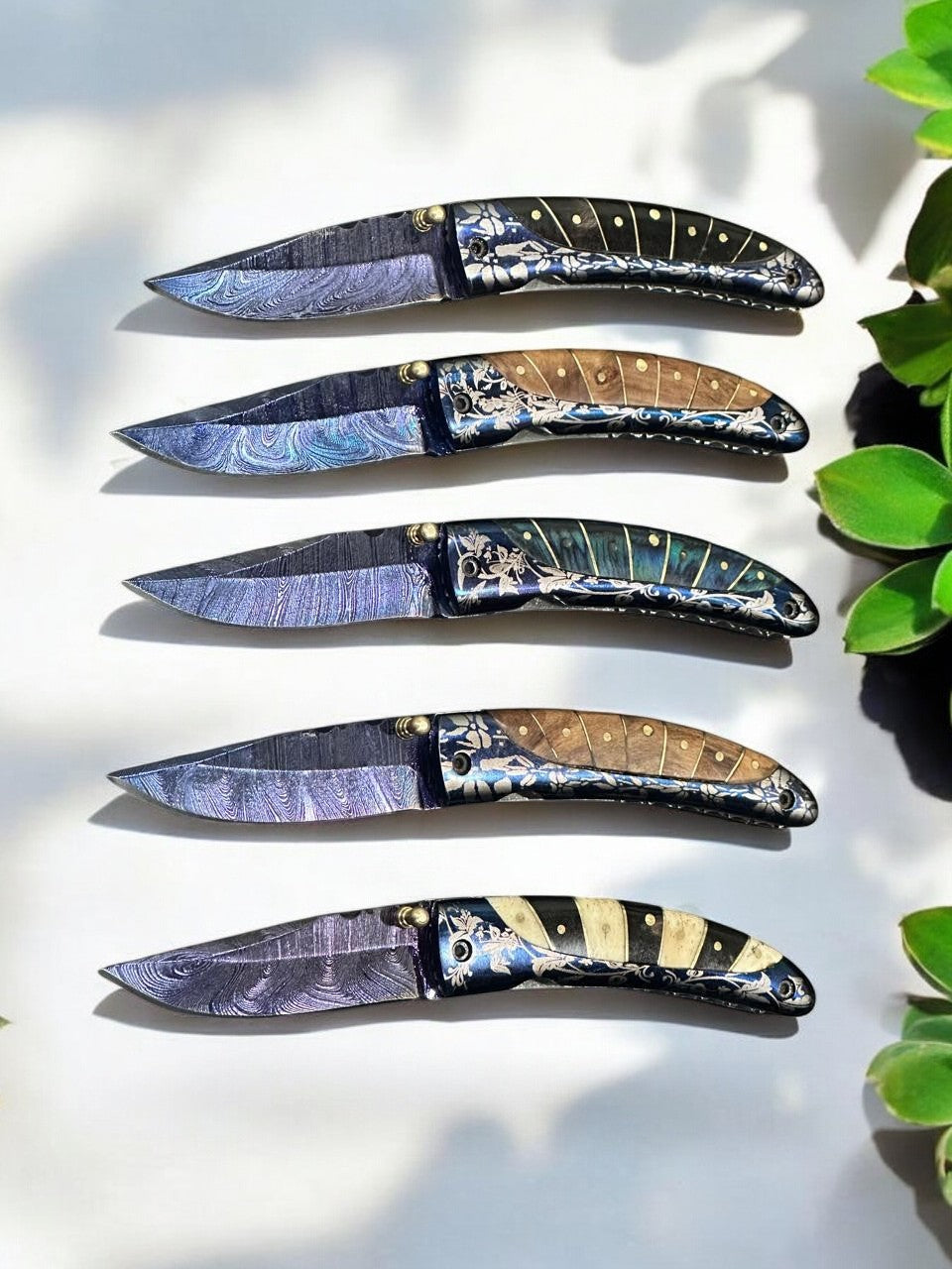Handmade Artistry: 30% Off on Patina Damascus Folding Knife – Limited Stock!