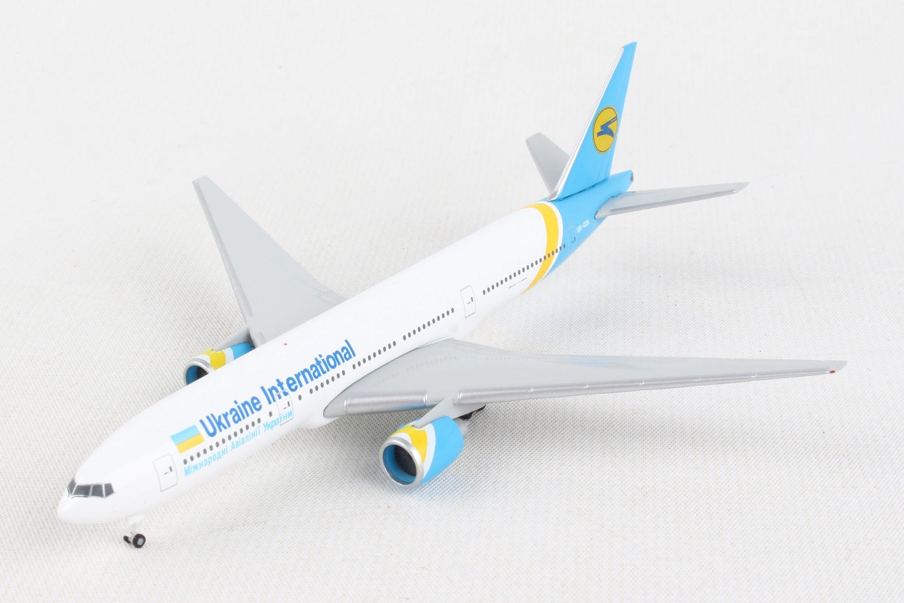 Herpa Wings HE531122 Ukraine 777-200 1/500
