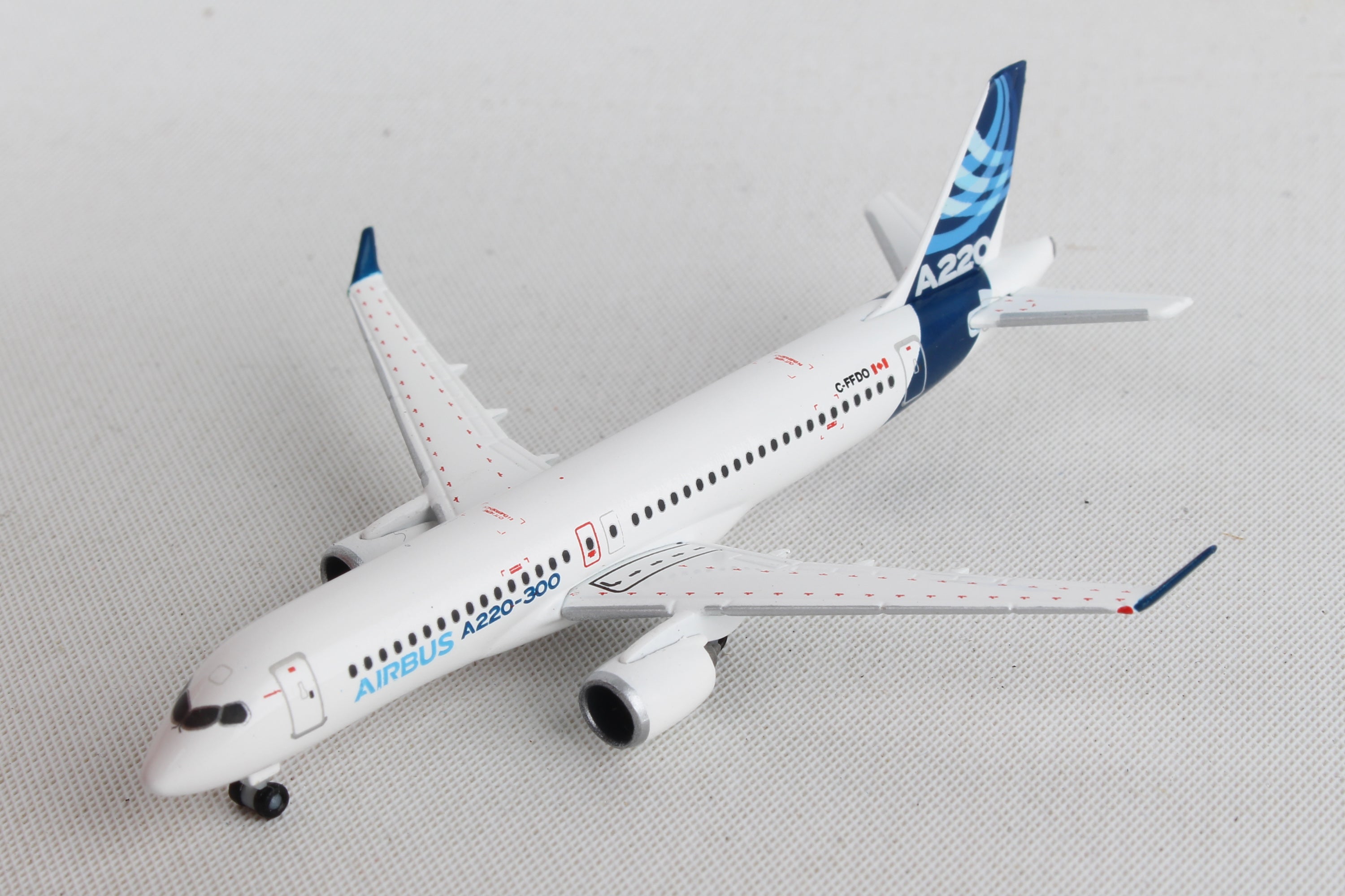 Herpa Wings HE532822 Airbus House A220-300 1/500