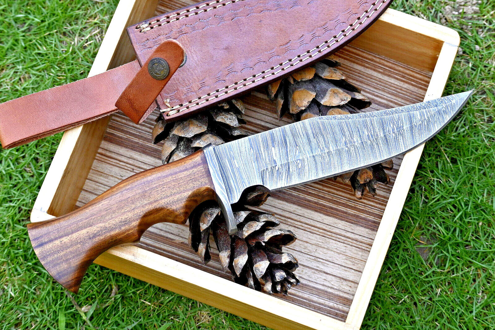 Wilderness Guardian: Hunting Knife with Damascus Steel Blade, Rosewood Handle, Damascus Guard, and Leather Sheath