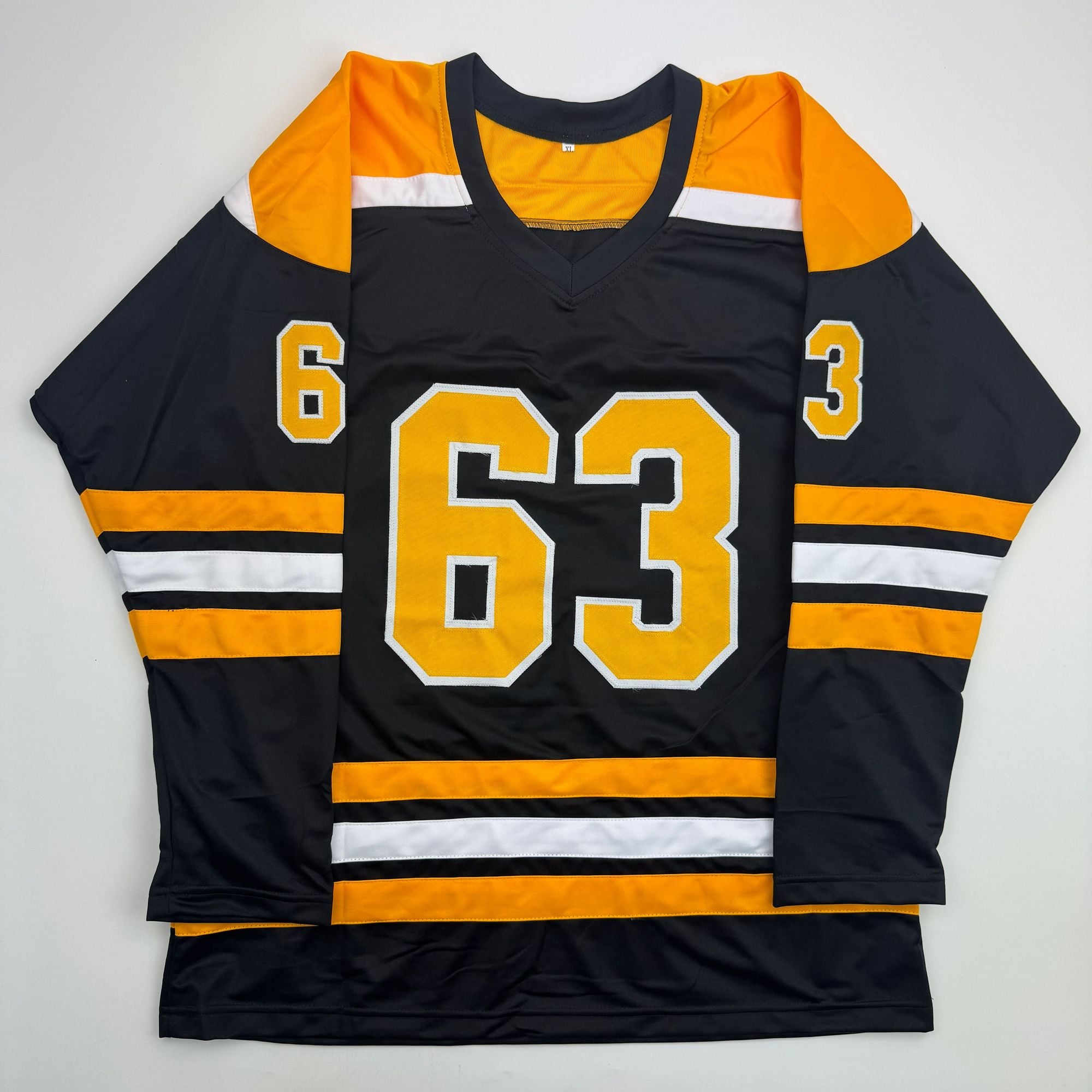 Autographed/Signed Brad Marchand Boston Black Hockey Jersey JSA COA