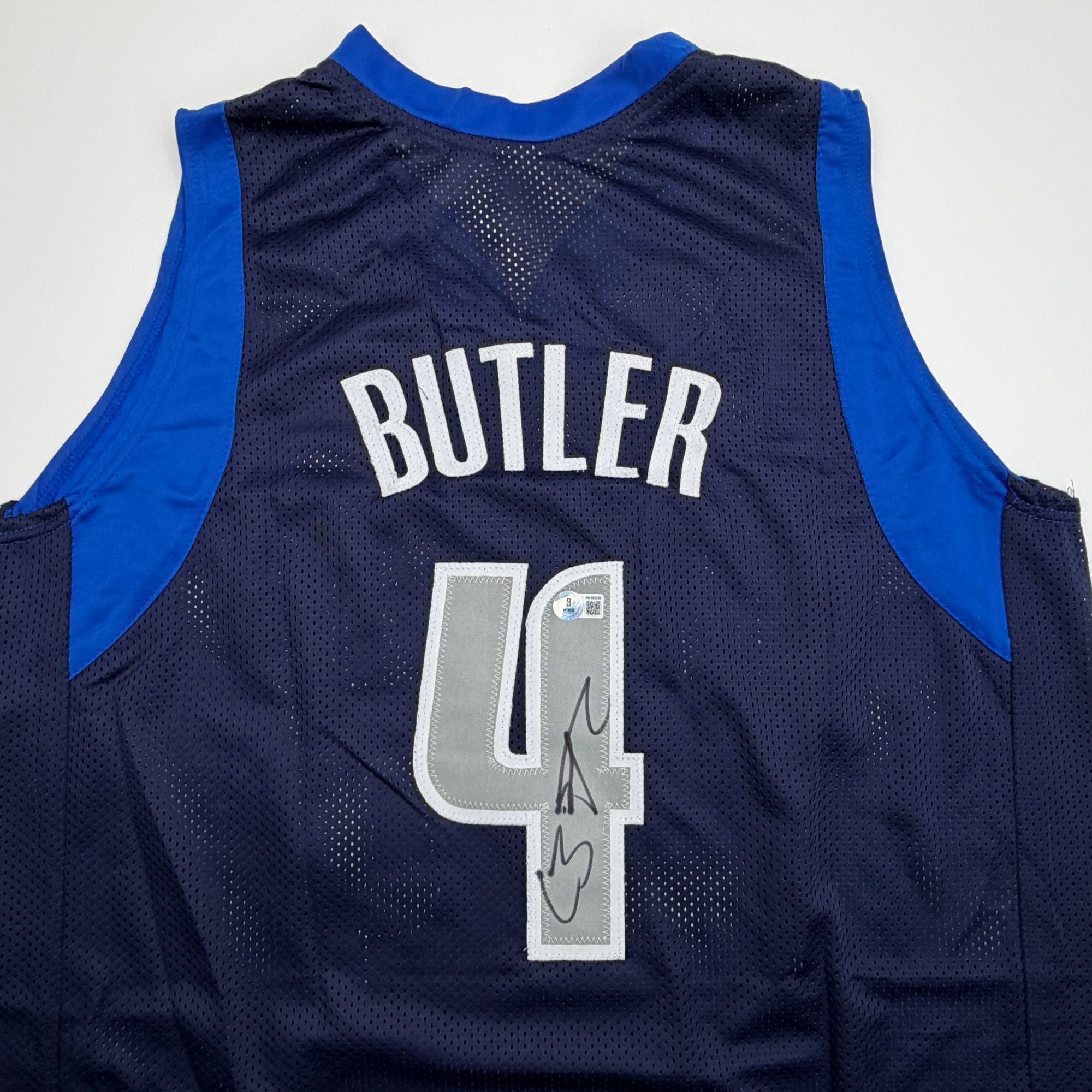 Autographed/Signed Caron Butler Dallas Blue Basketball Jersey Beckett BAS COA