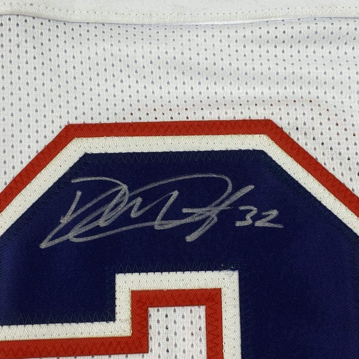 Framed Autographed/Signed Devin McCourty 35x39 New England White Football Jersey JSA COA