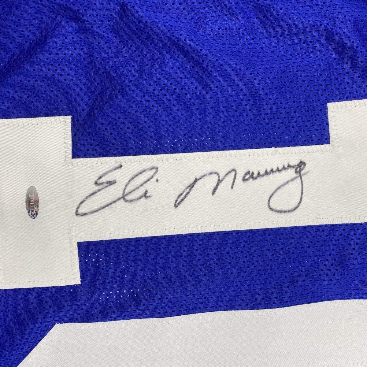 Framed Autographed/Signed Eli Manning 35x39 New York Blue Football Jersey Steiner Sports COA Hologram Only