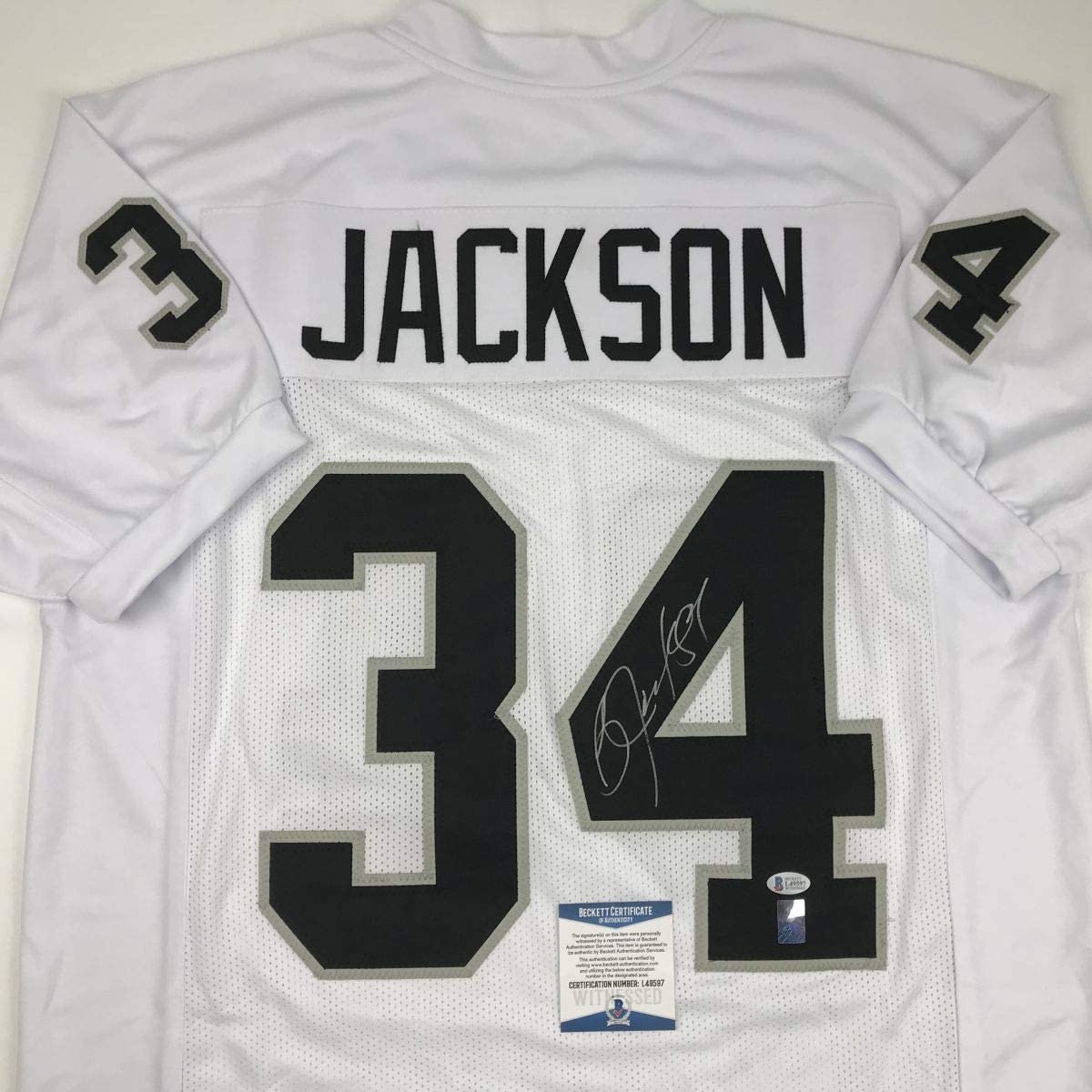 Autographed/Signed Bo Jackson Oakland White Football Jersey Beckett BAS COA