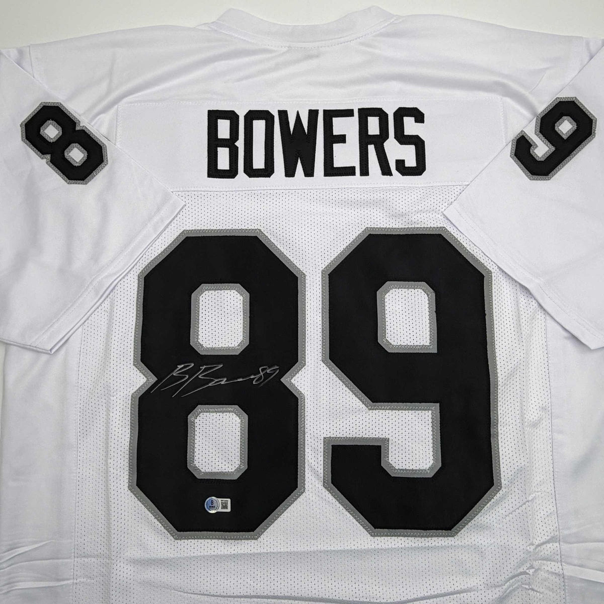 Autographed/Signed Brock Bowers Las Vegas Oakland White Football Jersey Beckett BAS COA