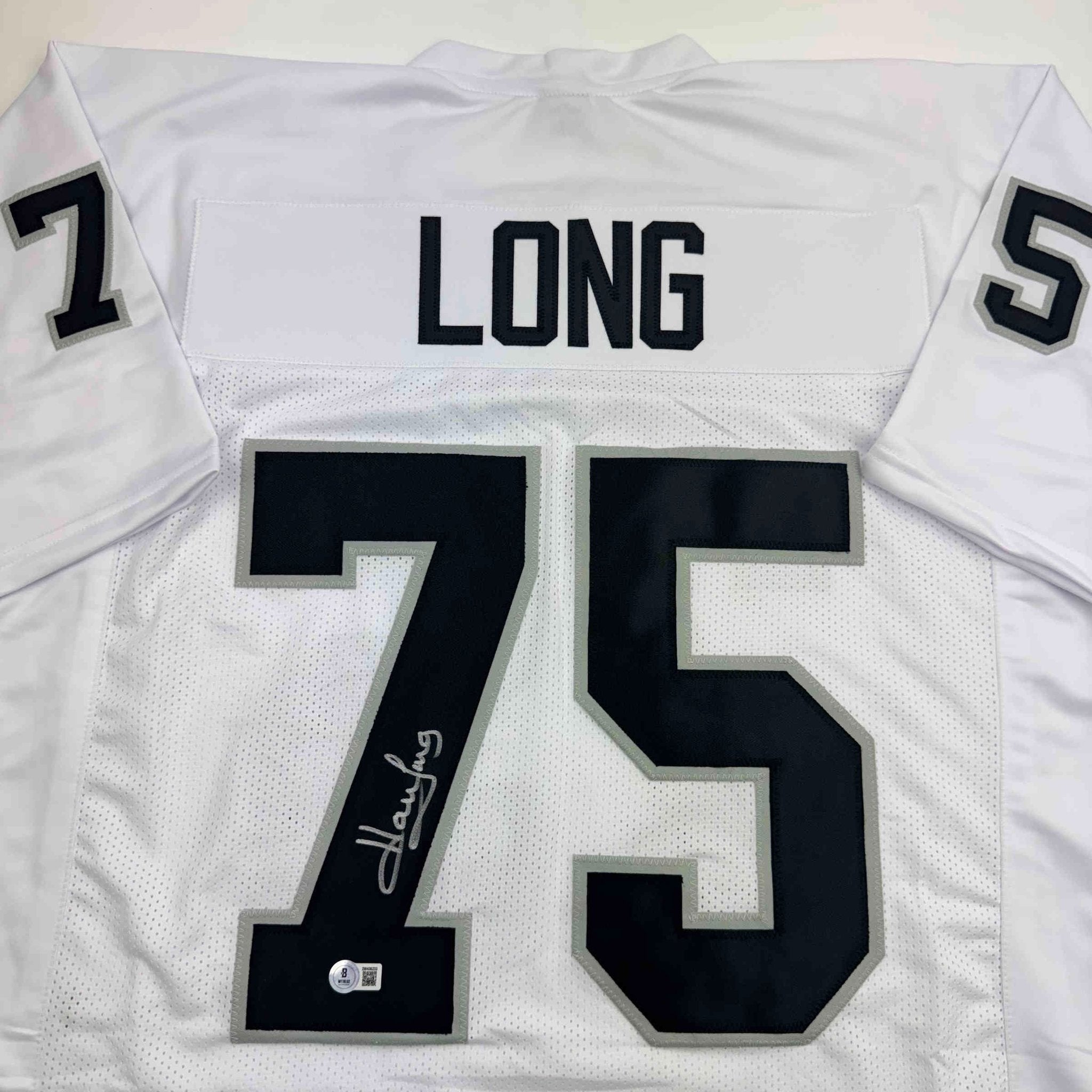 Autographed/Signed Howie Long Oakland White Football Jersey Beckett BAS COA