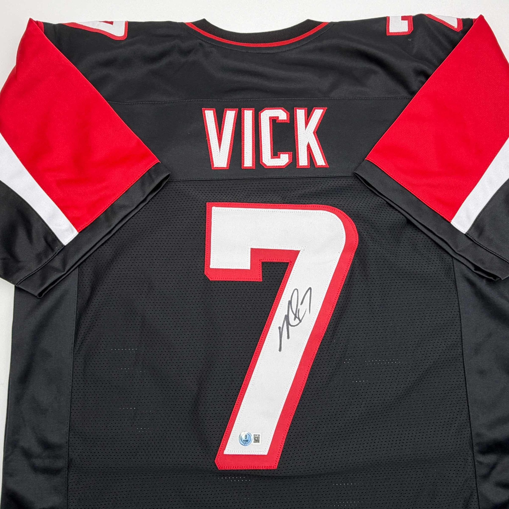 Autographed/Signed Michael Mike Vick Atlanta Black Football Jersey Beckett BAS COA