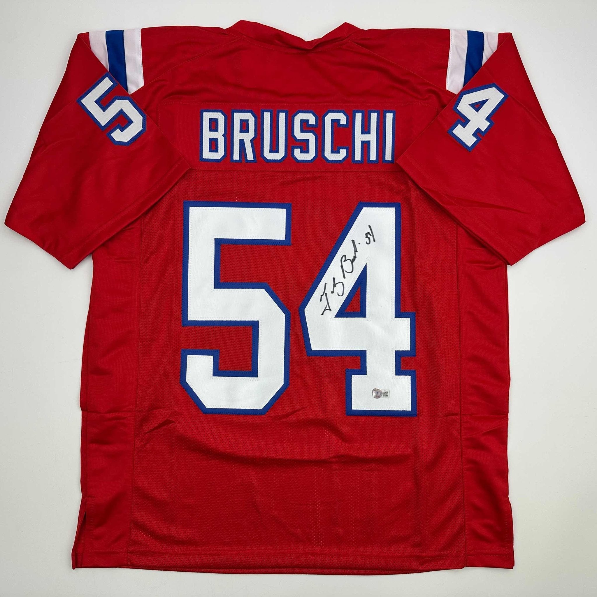 Autographed/Signed Tedy Bruschi New England Red Football Jersey Beckett BAS COA