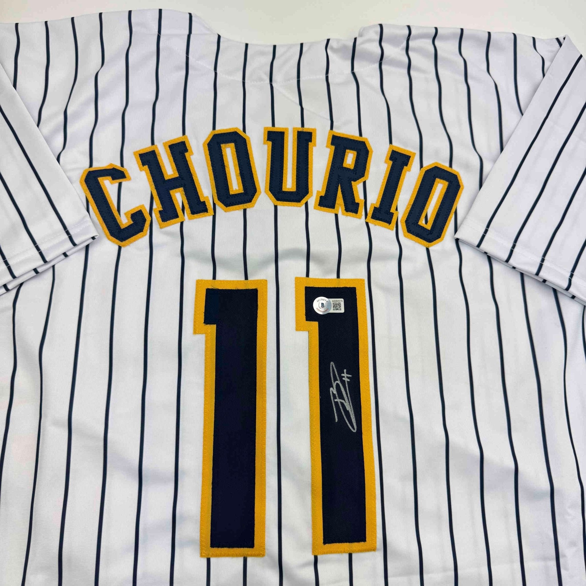 Autographed/Signed Jackson Chourio Milwaukee Pinstripe Baseball Jersey Beckett BAS COA
