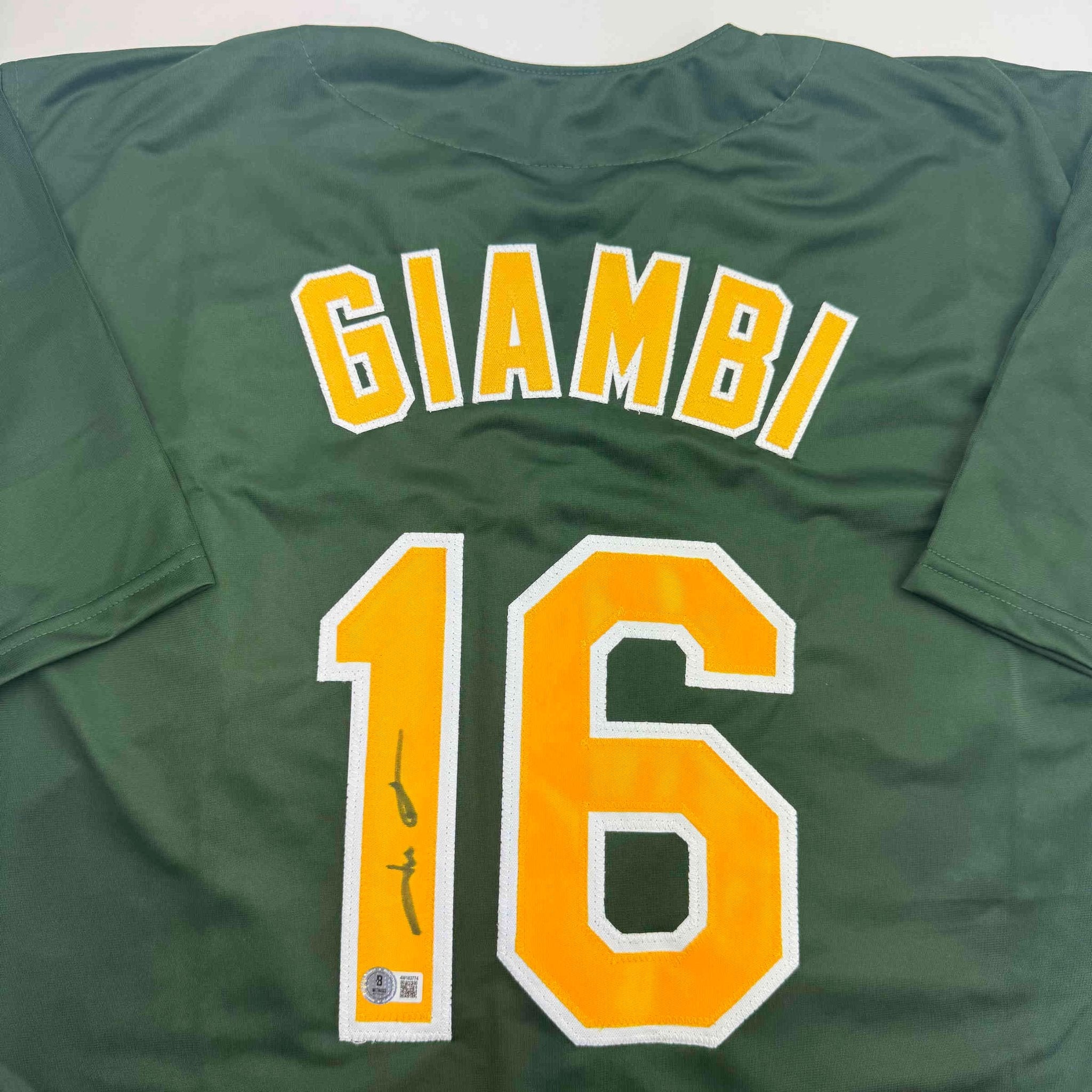 Autographed/Signed Jason Giambi Oakland Green Baseball Jersey Beckett BAS COA