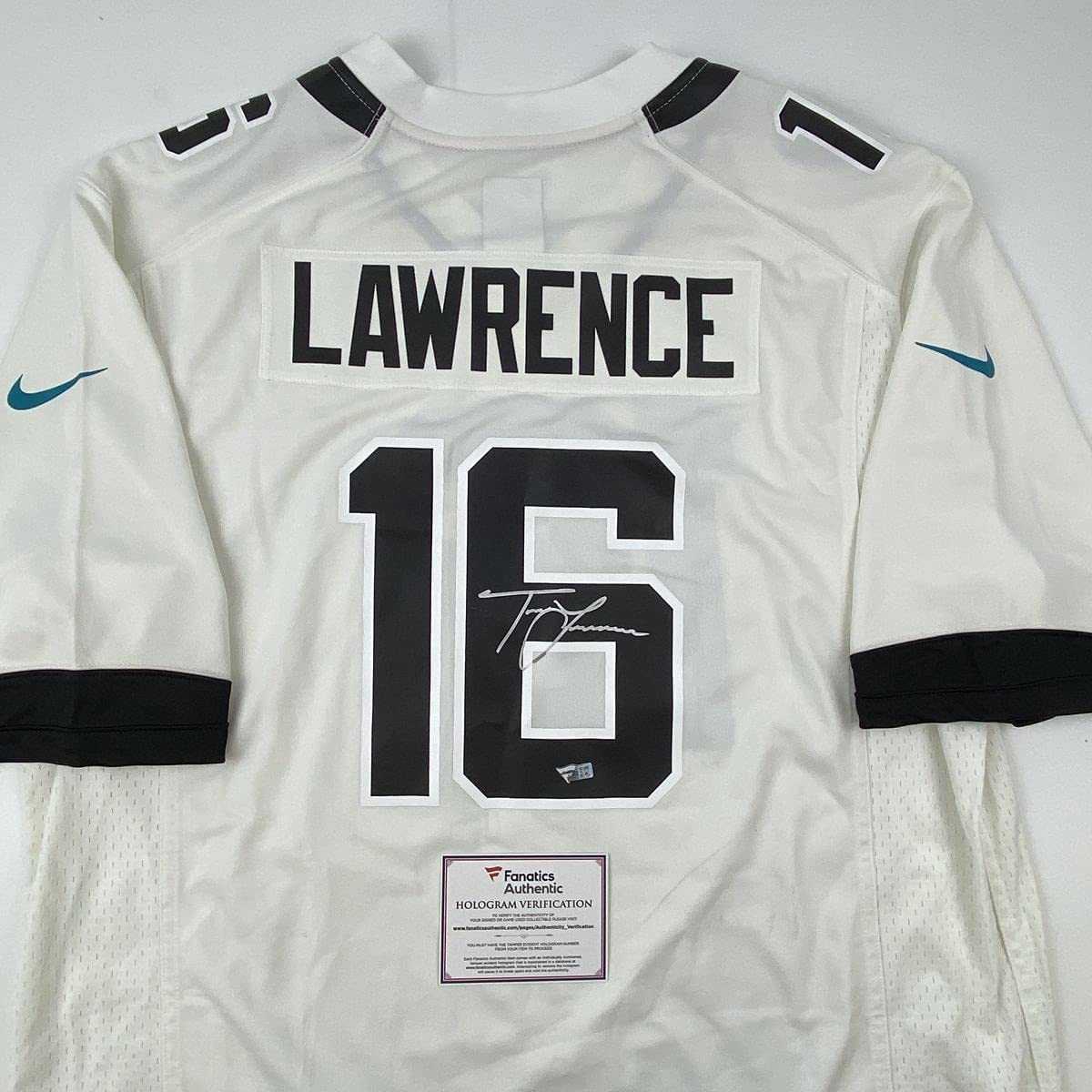 Autographed/Signed Trevor Lawrence Jacksonville Jaguars White Nike Game Football Jersey Fanatics COA