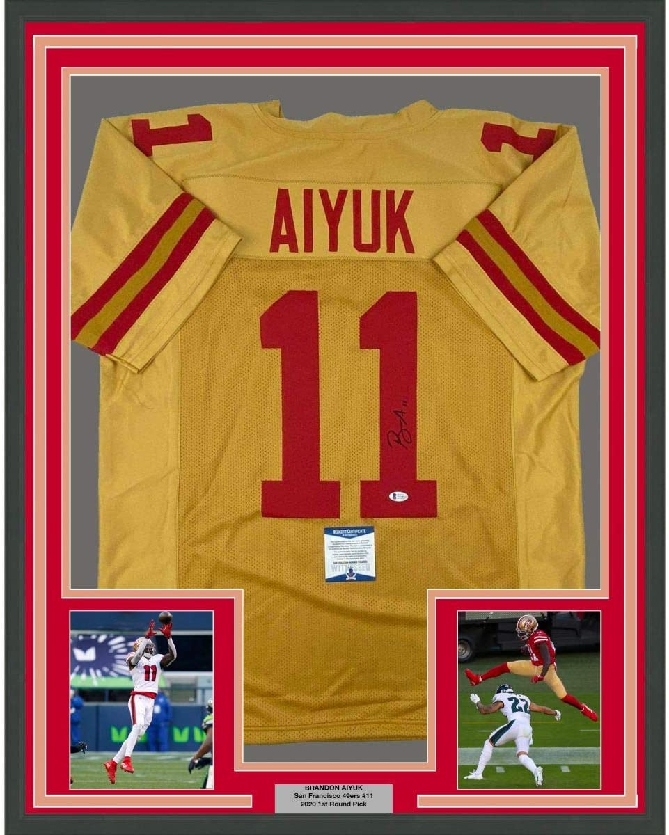 Framed Autographed/Signed Brandon Aiyuk 35x39 San Francisco Gold Football Jersey Beckett BAS COA