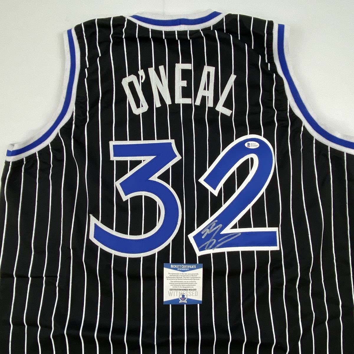 Autographed/Signed Shaquille Shaq O'Neal Orlando Black Pinstripe Basketball Jersey Beckett BAS COA