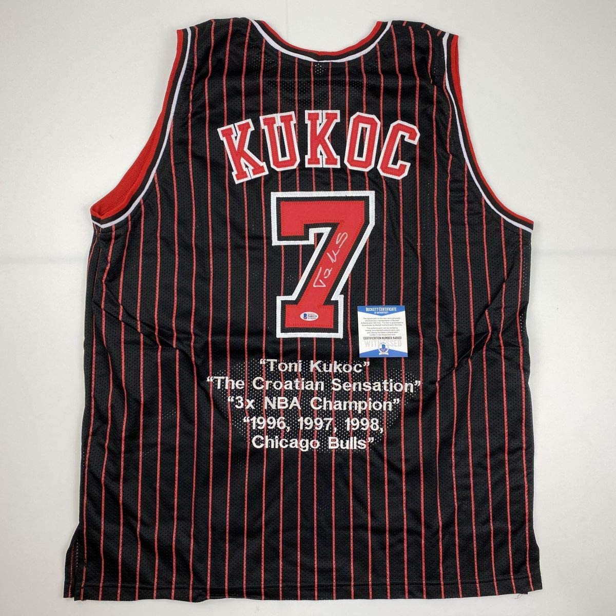 Autographed/Signed Toni Kukoc Chicago Black Pinstripe Stat Basketball Jersey Beckett BAS COA