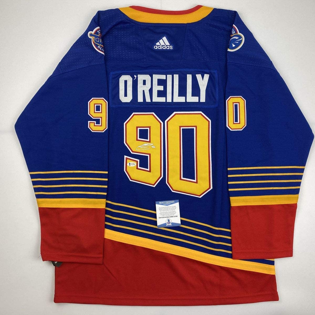 Autographed/Signed Ryan O'Reilly St. Louis Retro Blue Hockey Jersey Beckett BAS COA