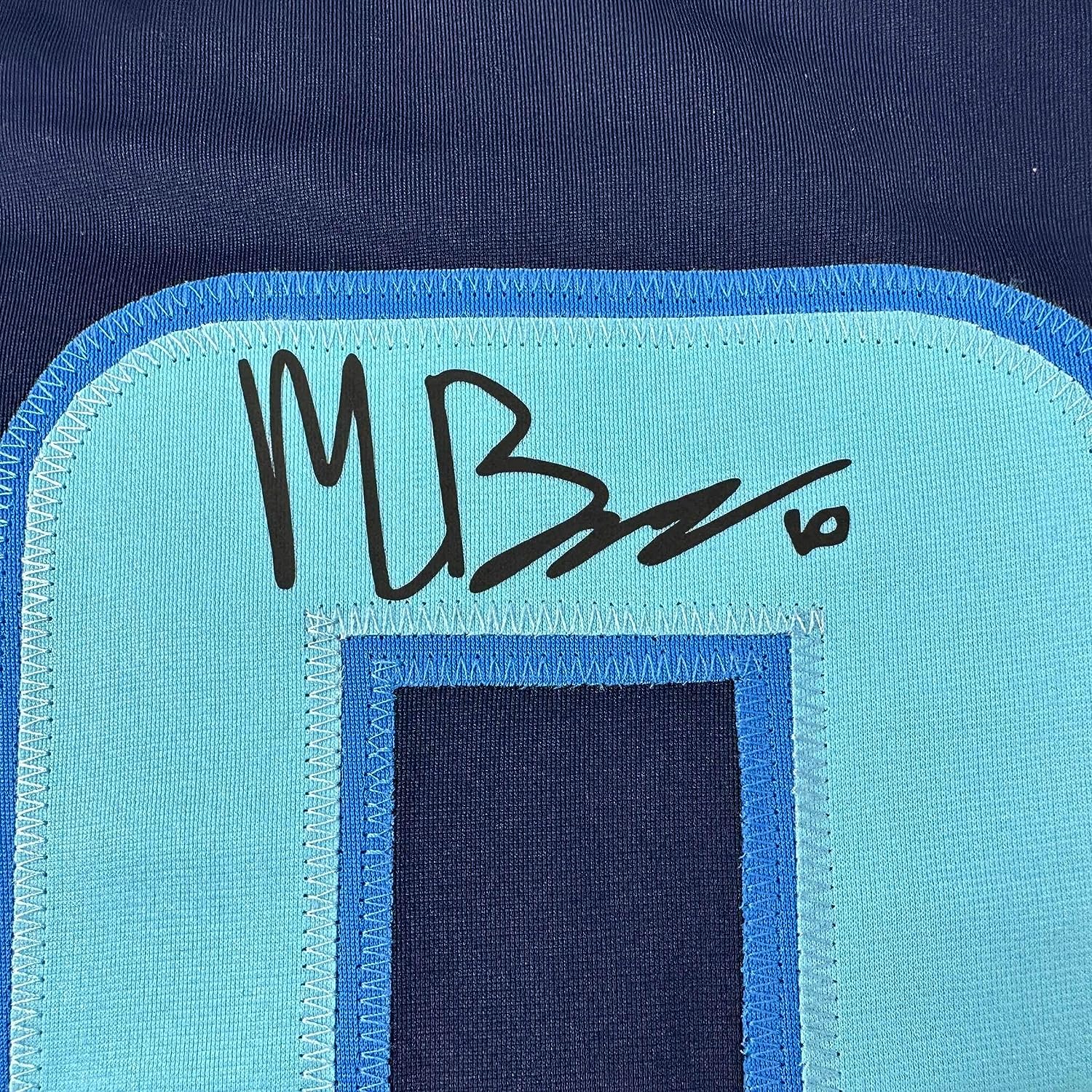 Framed Facsimile Autographed Matty Beniers 35x39 Seattle Blue Reprint Laser Auto Hockey Jersey