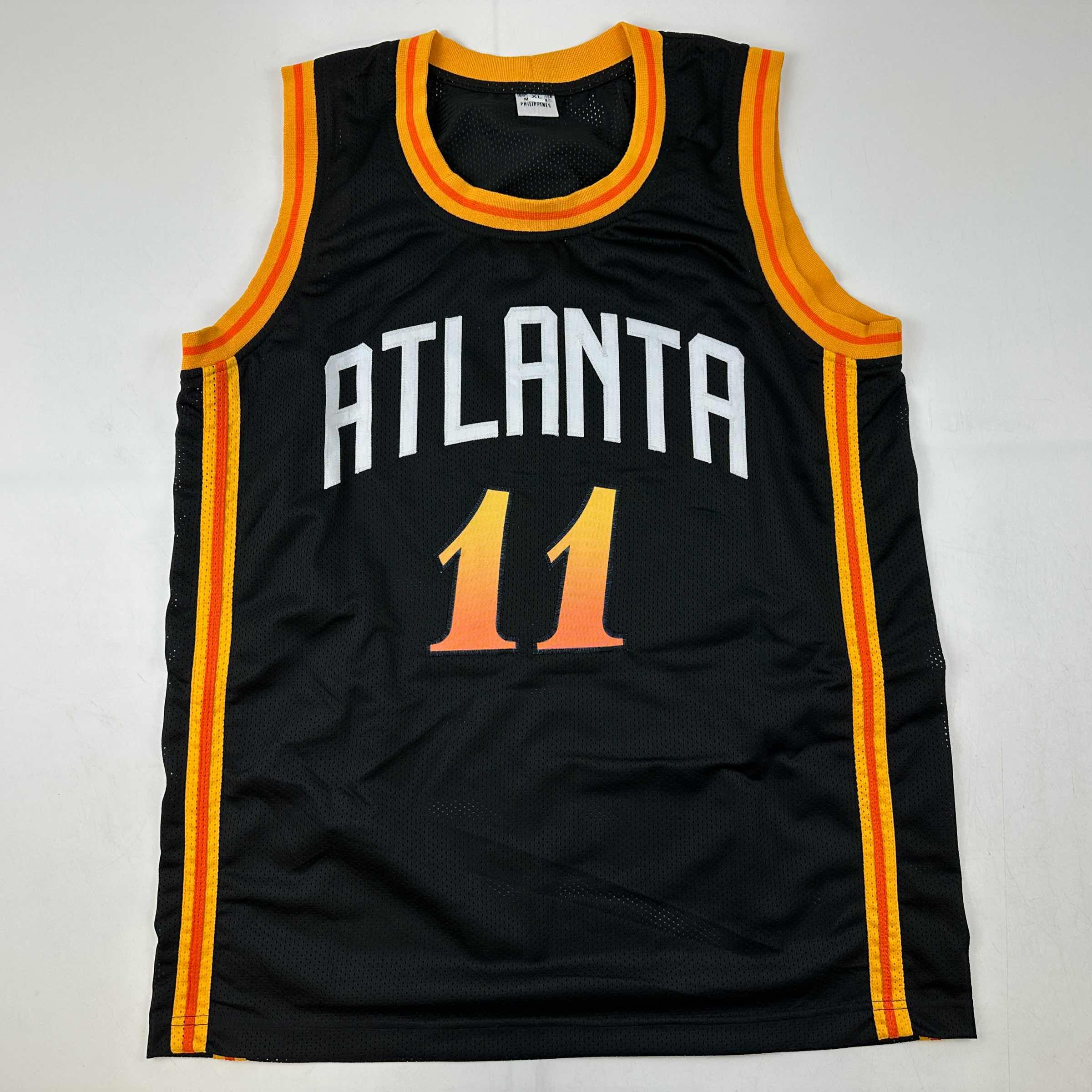 Autographed/Signed Trae Young Atlanta Black City Edition Basketball Jersey JSA COA