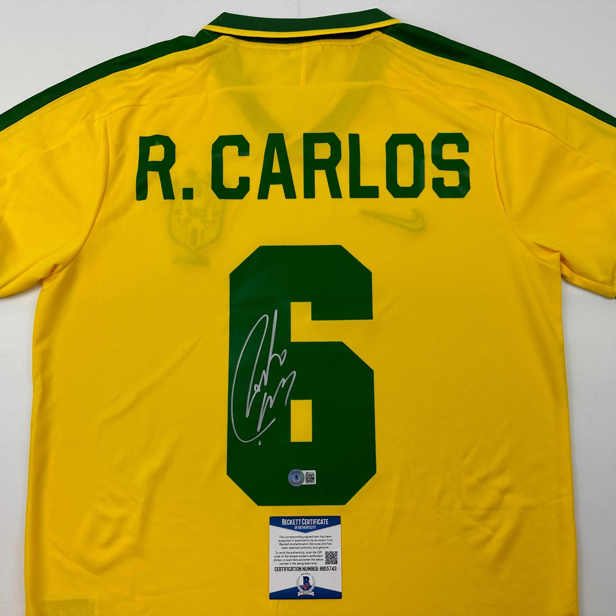 Autographed/Signed Roberto Carlos Brazil Yellow Retro Soccer Jersey Beckett BAS COA