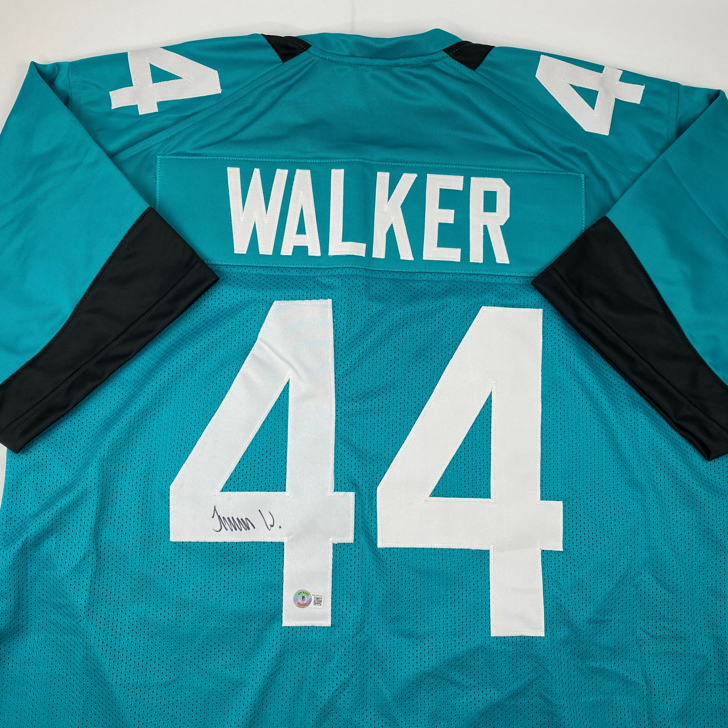 Autographed/Signed Travon Walker Jacksonville Teal Football Jersey Beckett BAS COA