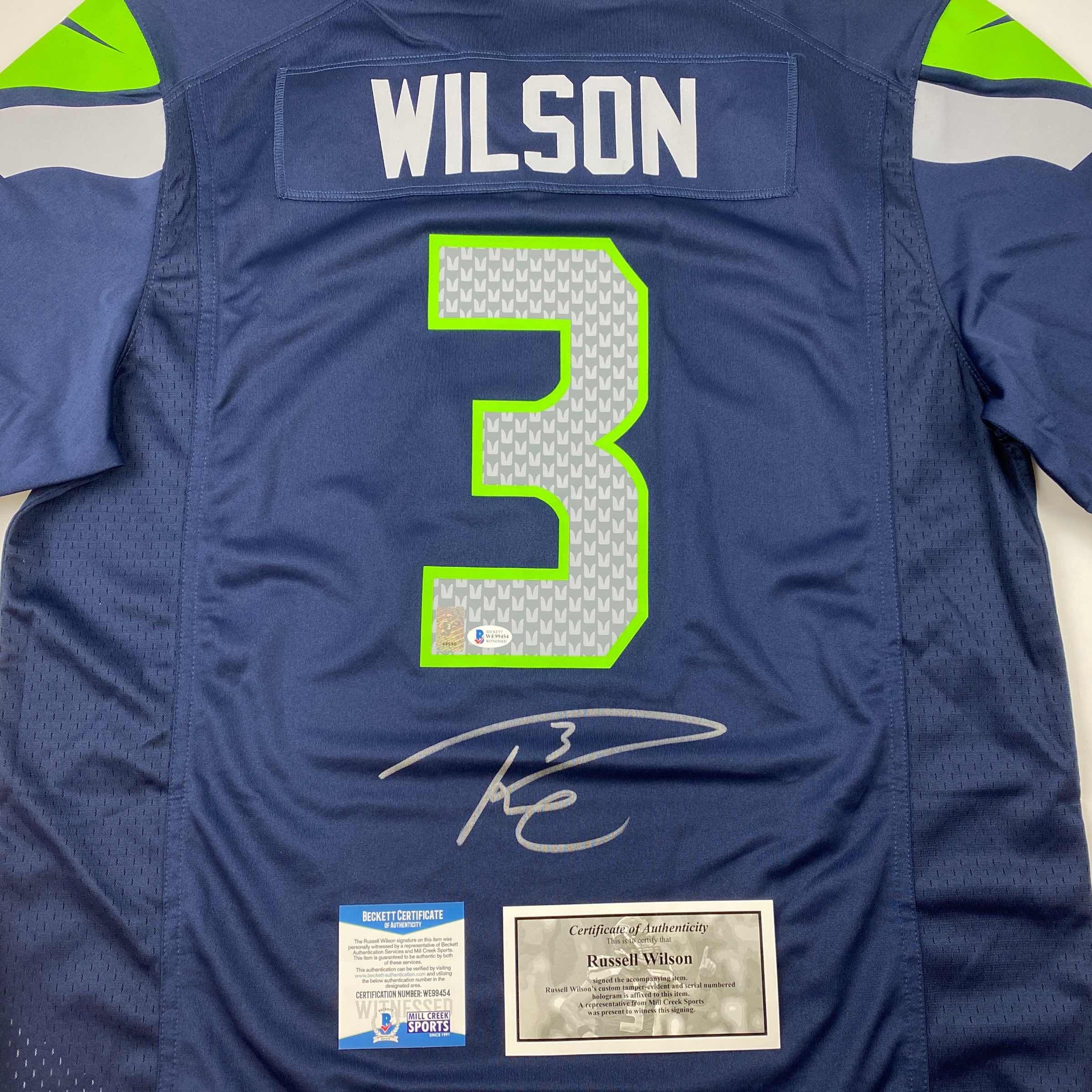 Autographed/Signed Russell Wilson Seattle Seahawks Blue Authentic Football Jersey Beckett BAS COA
