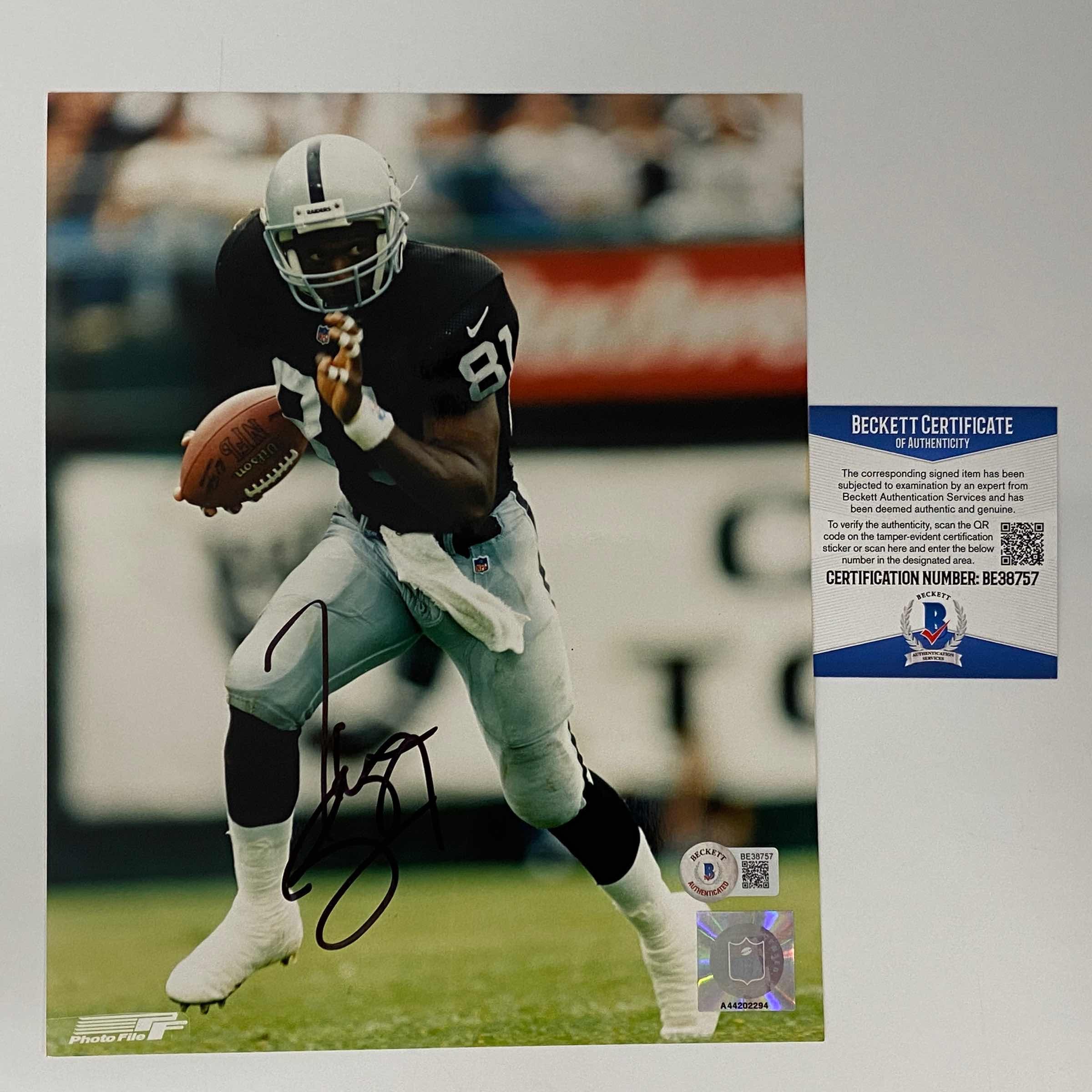 Autographed/Signed Tim Brown Las Vegas Oakland Raiders 8x10 Football Photo Beckett BAS COA #3