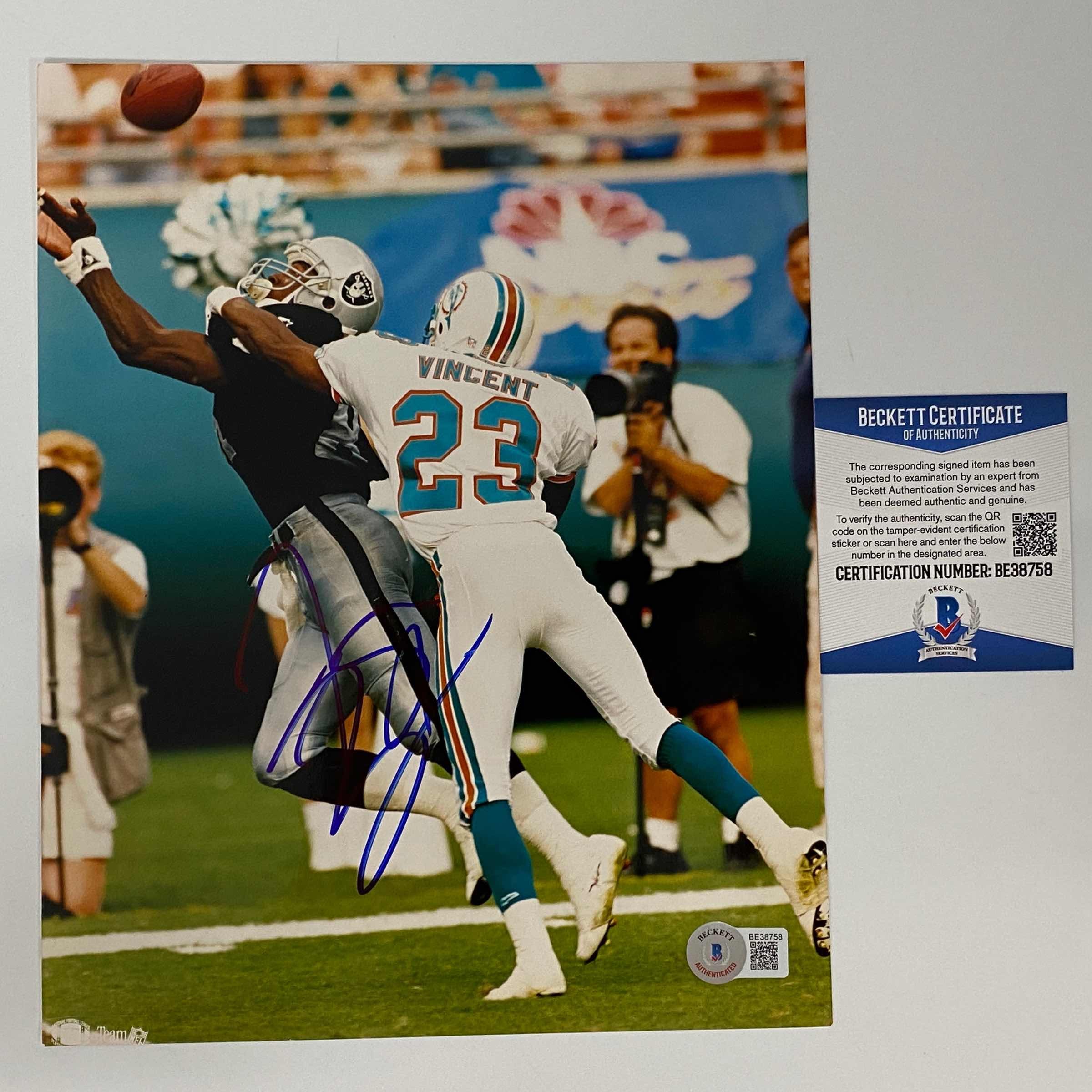 Autographed/Signed Tim Brown Las Vegas Oakland Raiders 8x10 Football Photo Beckett BAS COA #2