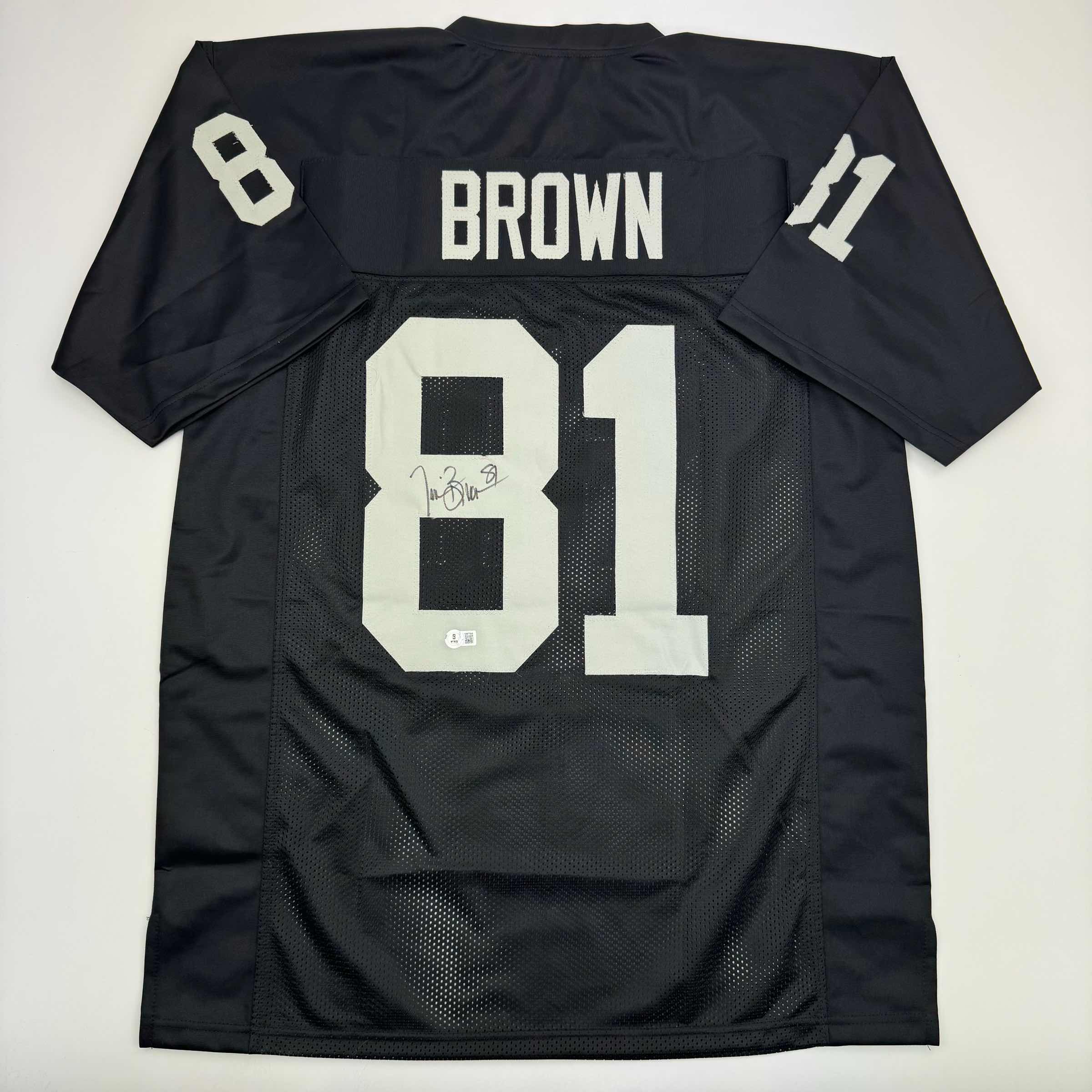 Autographed/Signed Tim Brown Oakland Black Football Jersey Beckett BAS COA