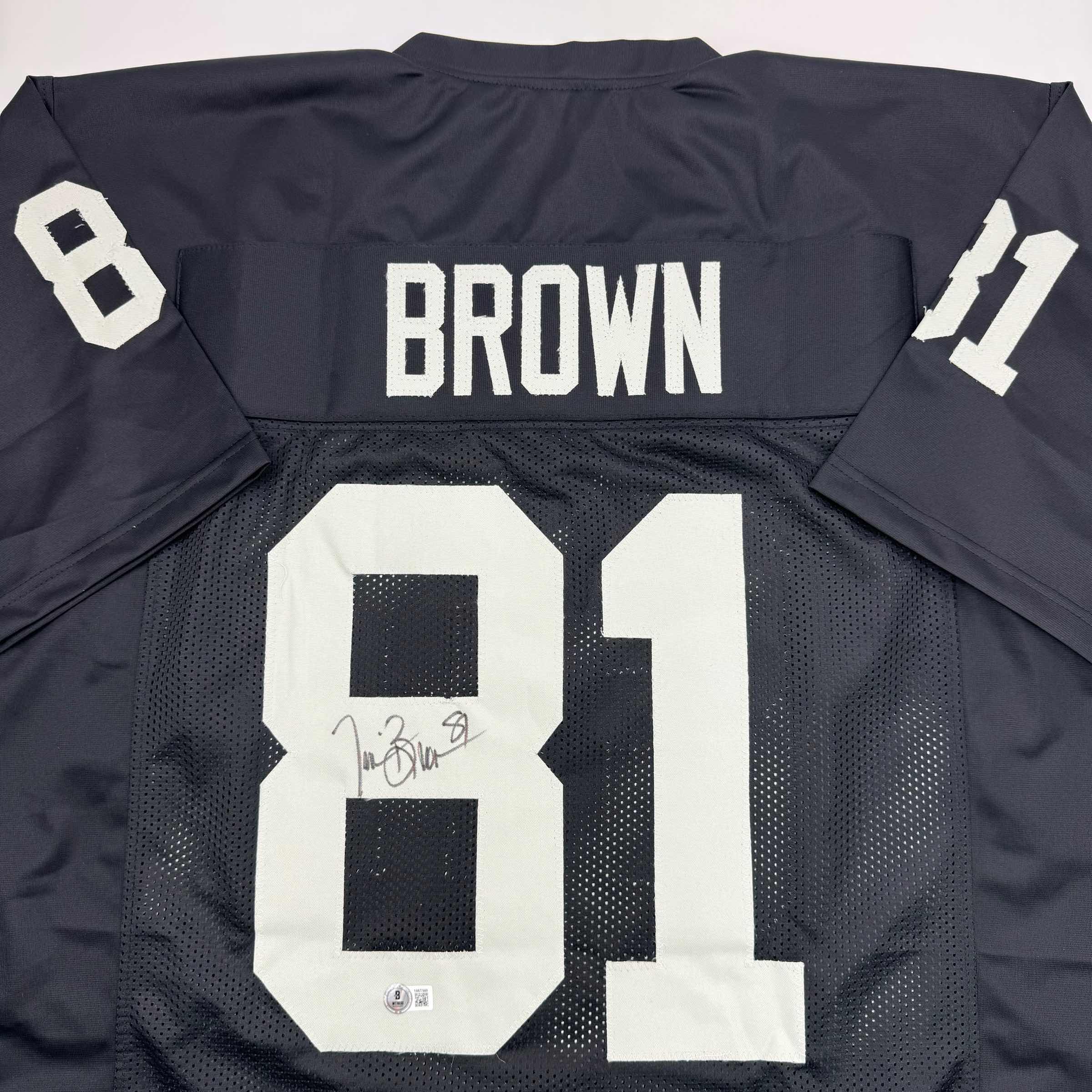 Autographed/Signed Tim Brown Oakland Black Football Jersey Beckett BAS COA