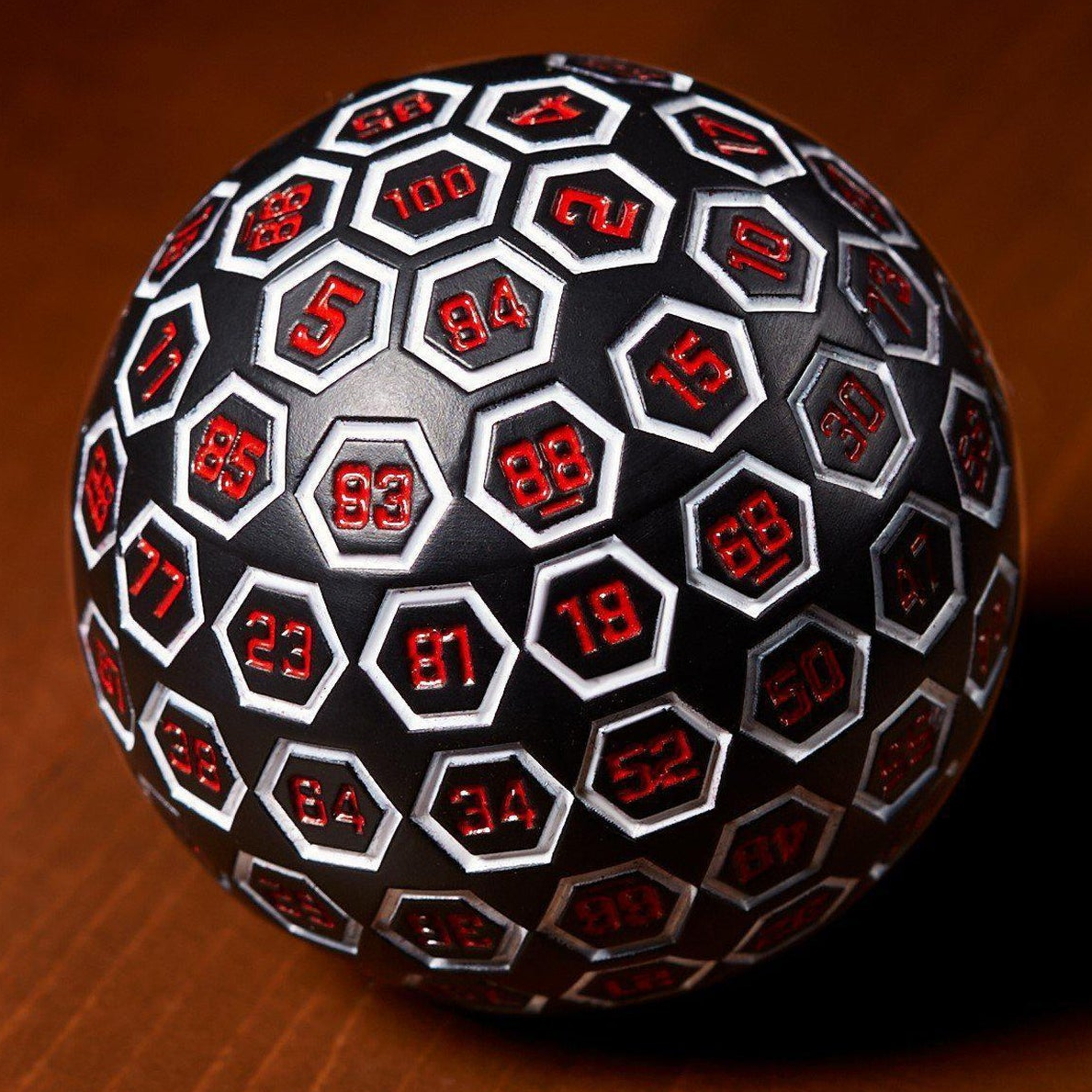 The Orb D100 -  White, Red, and Black Metal Die